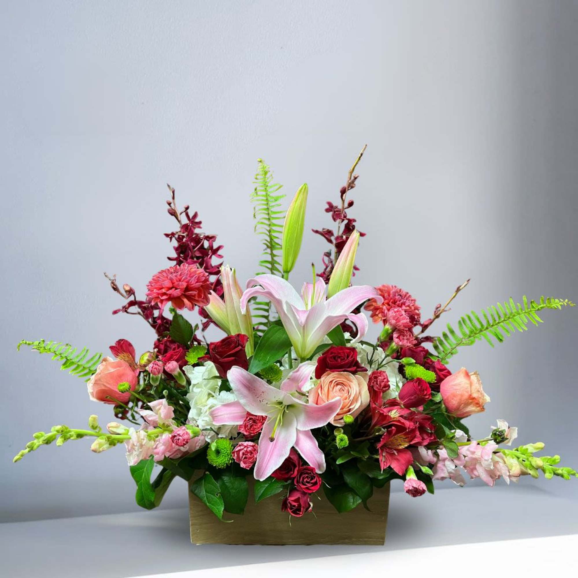 Recipe: Seasonal Dahlias, Burgendy Orchids, Stargazers, Orange/Pink Roses, Pink Snapdragons, Red Spray, photo 4 of 4