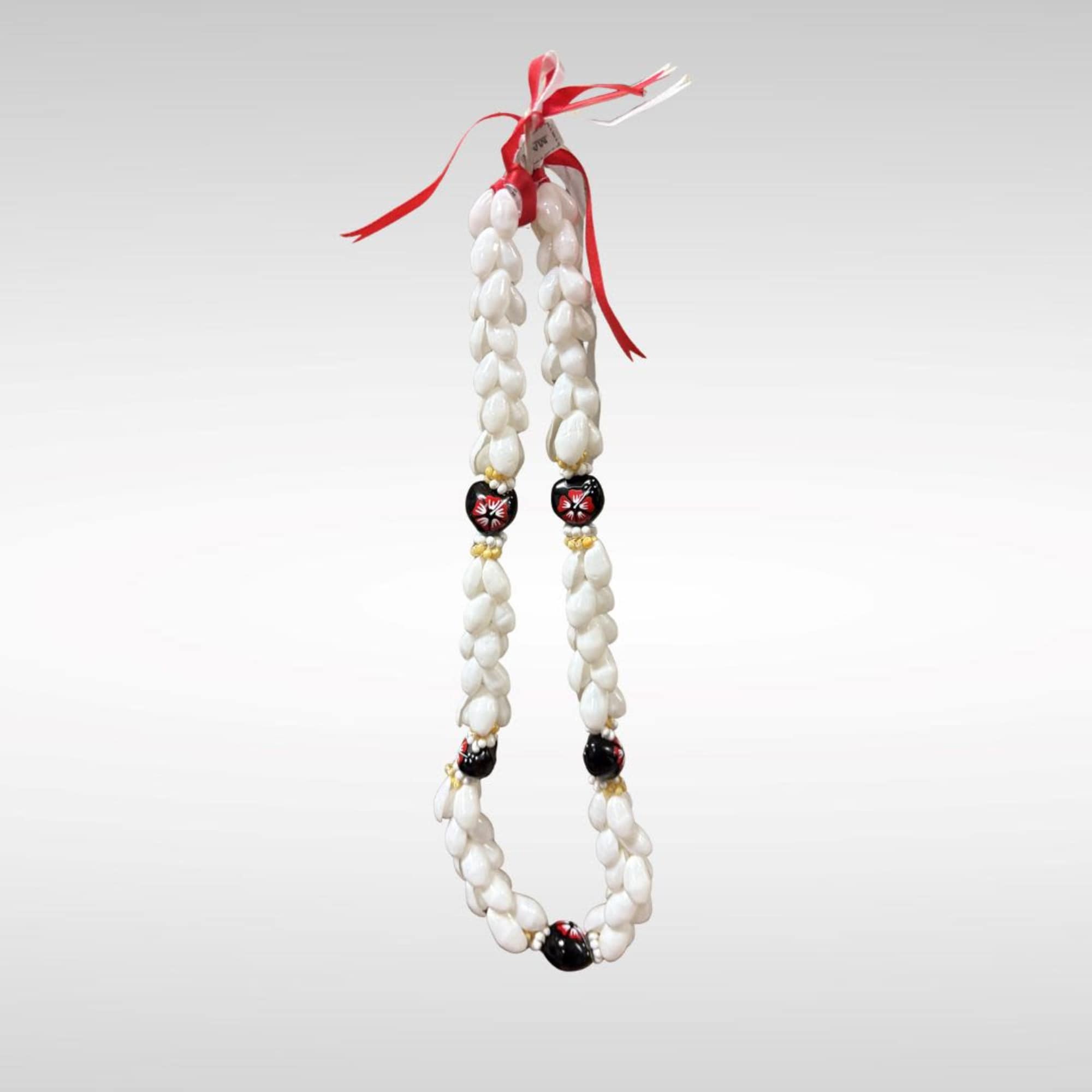 Kukui Nut Lei Red and Black Flower with White Pukka Shells.
Made in
