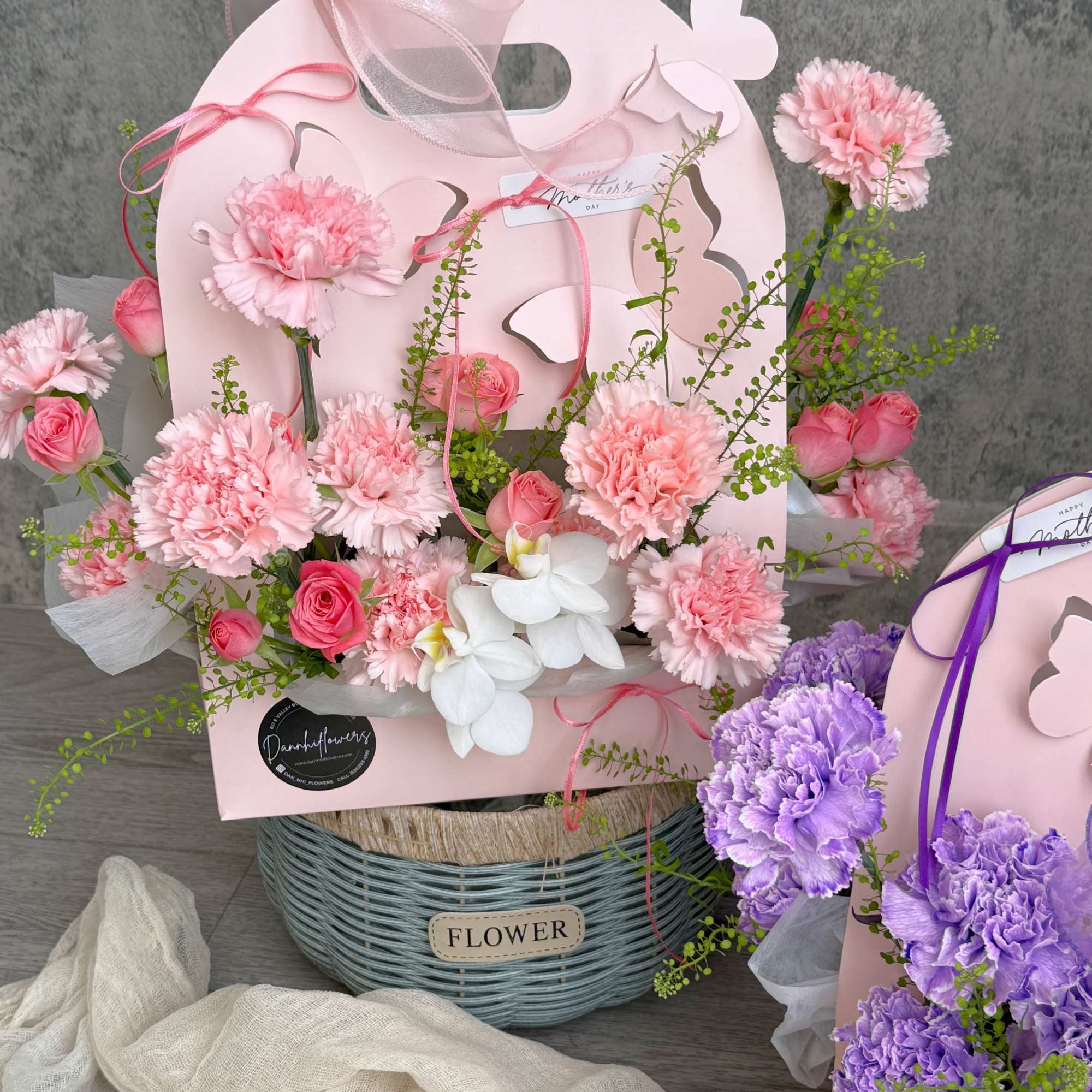 Delicate blooms in soft pastel tones, nestled in a charming butterfly pink, photo 2 of 3