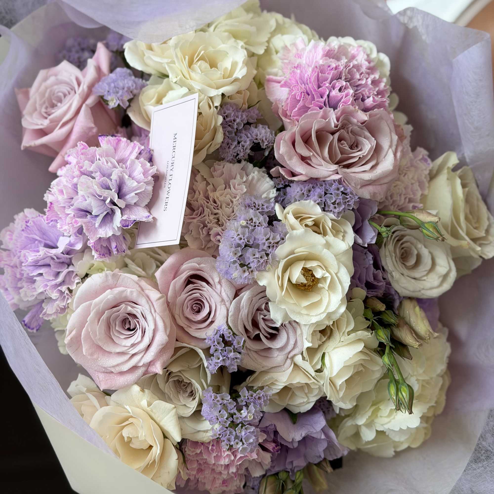 A dreamy pastel bouquet designed in soft shades of lavender, blush pink