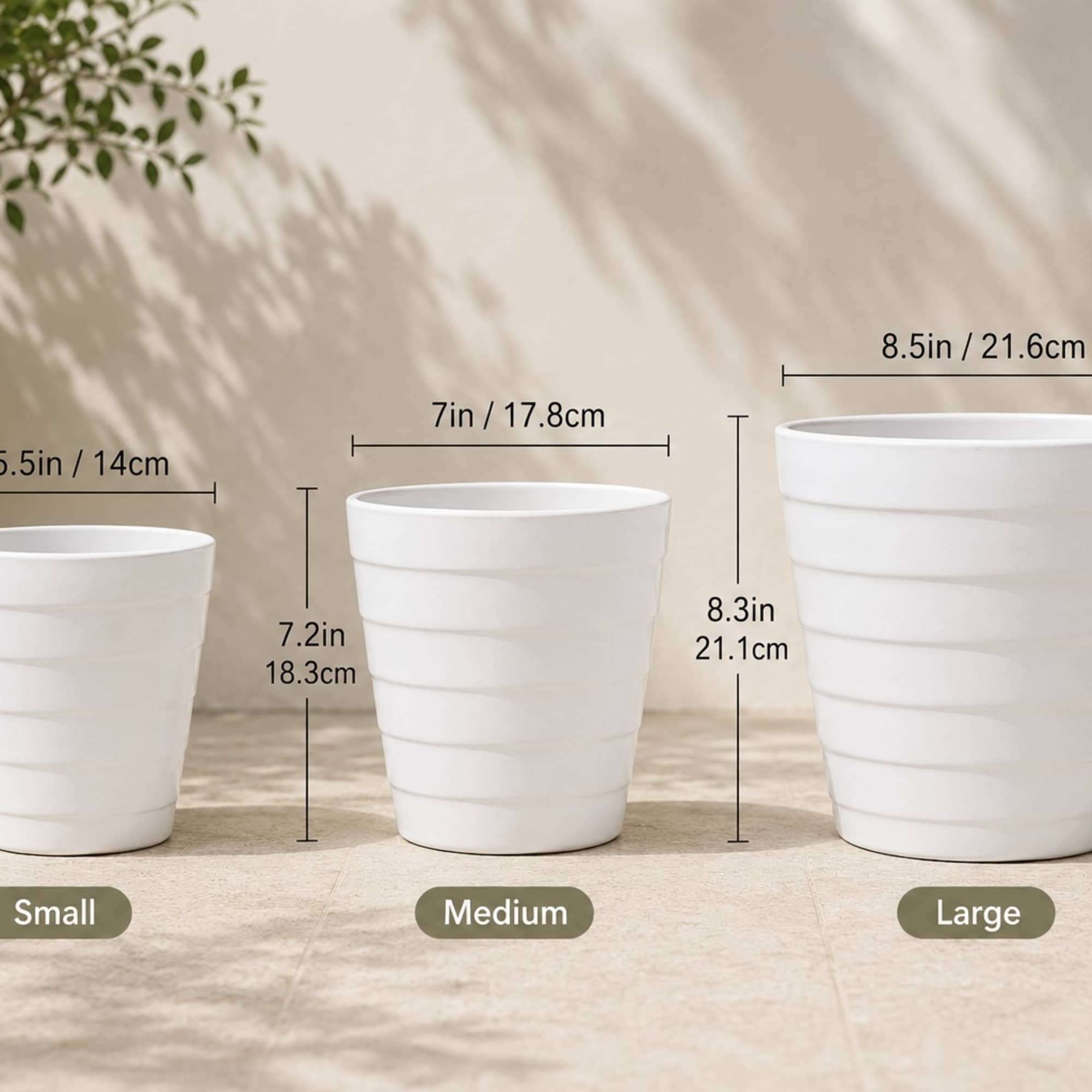 Three white tapered plant pots labeled small, medium, and large