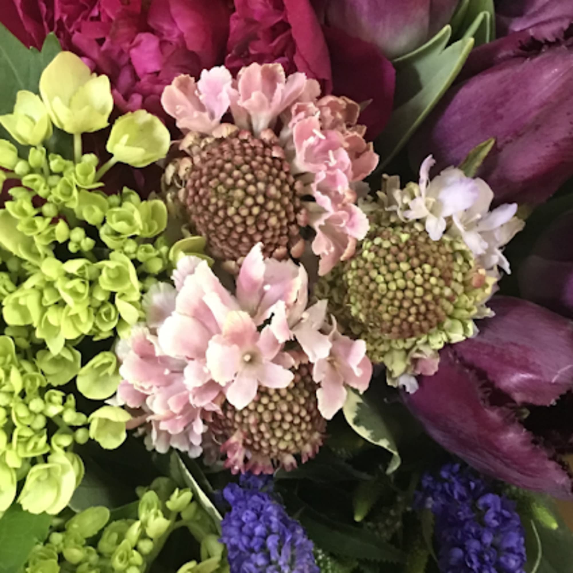 Trust our designers to create a one of a kind arrangement using, photo 2 of 3
