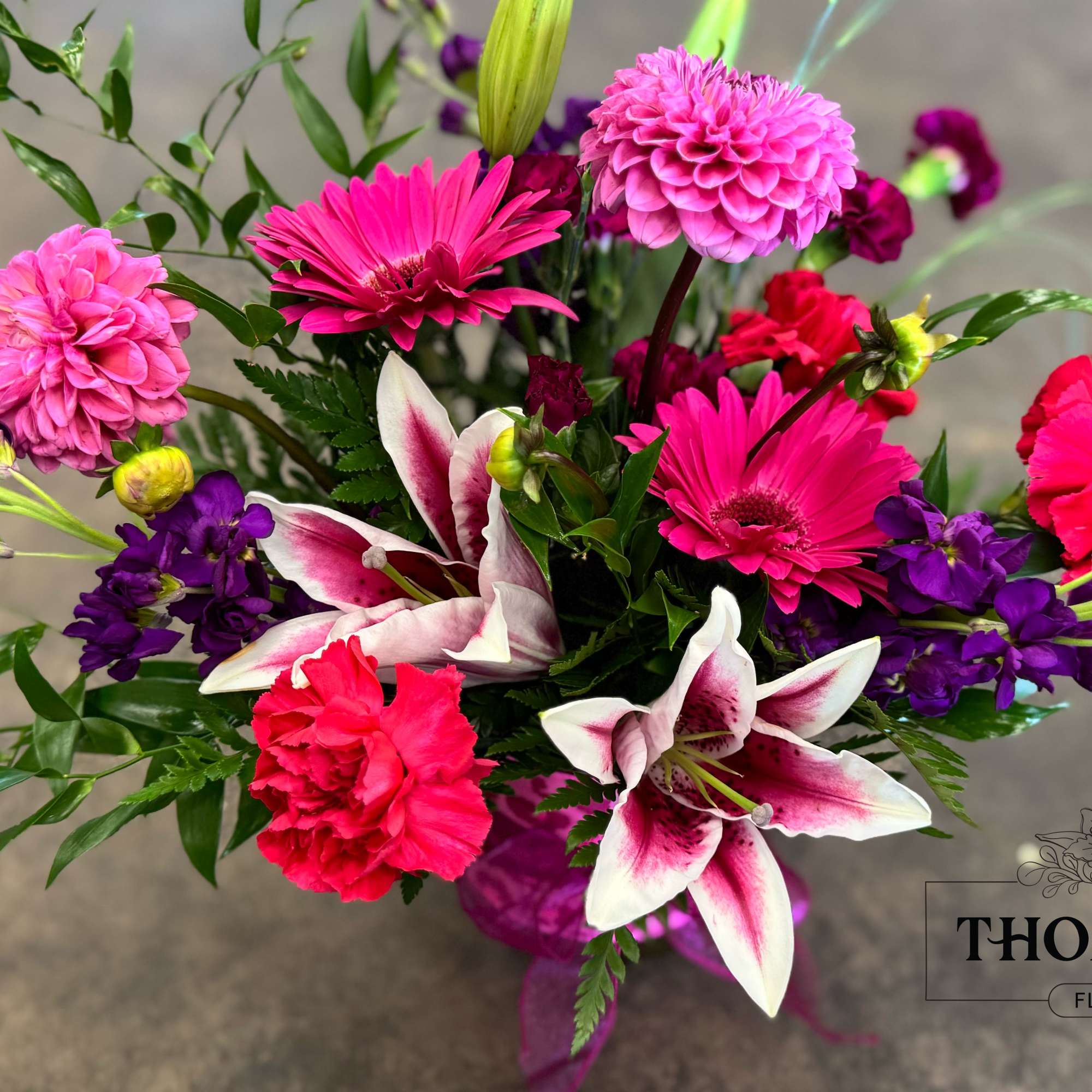 Mixed bouquet with pink, purple, and white flowers
