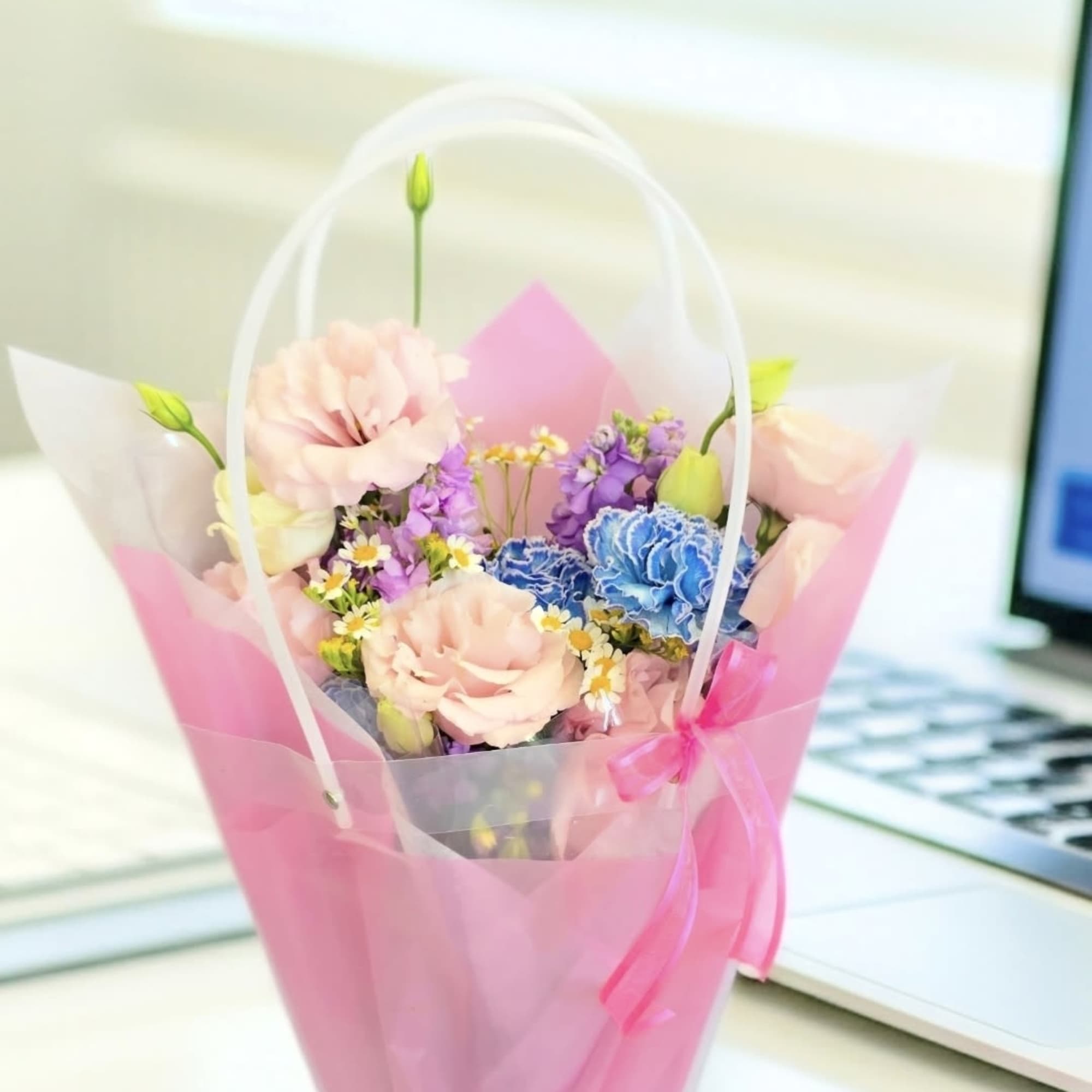 This bouquet will come with water source strapped in tissue paper and