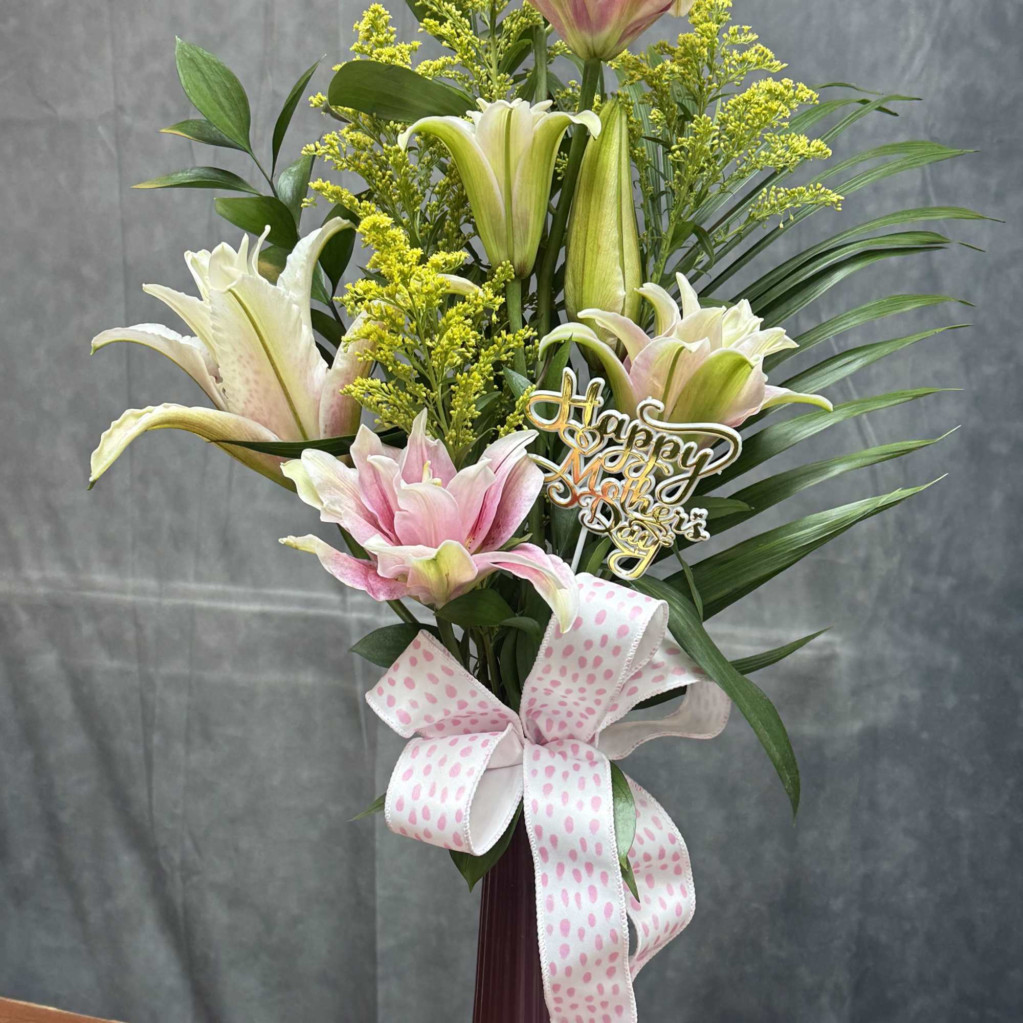 Brighten any day with our handcrafted Pink Love floral arrangements, perfect for