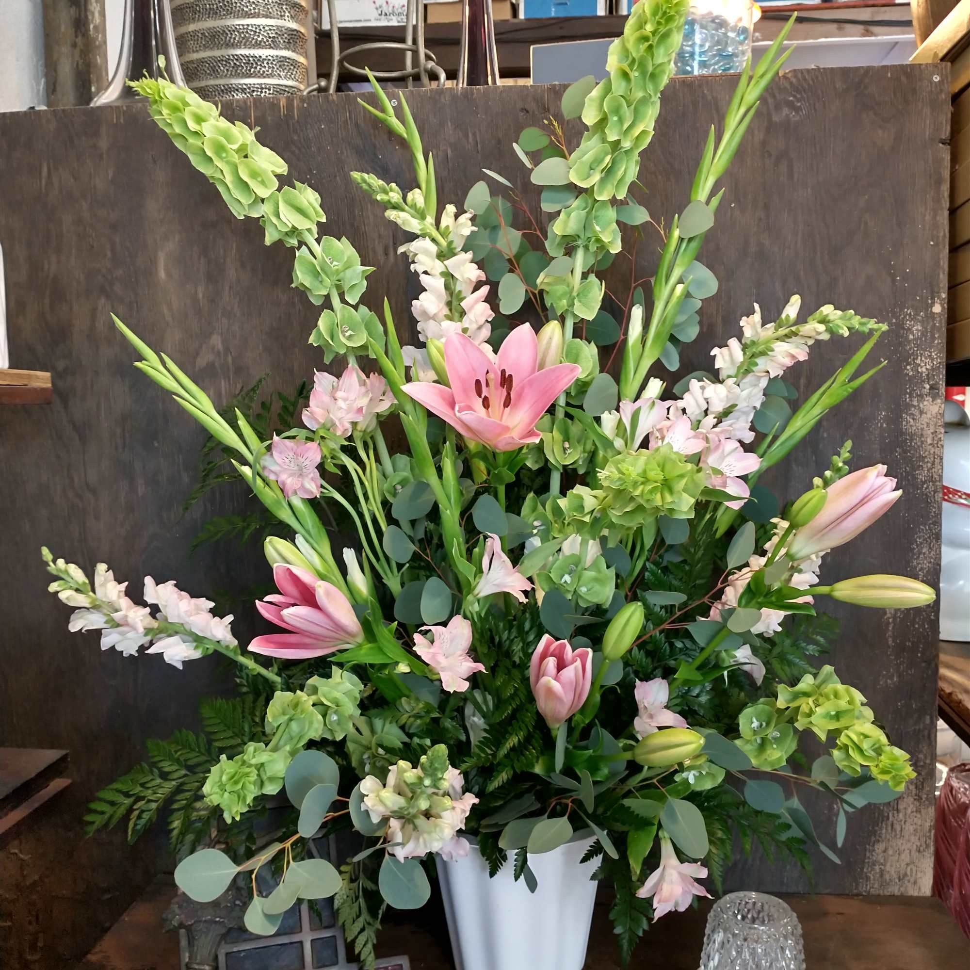 Sympathy arrangement in green white and pink 