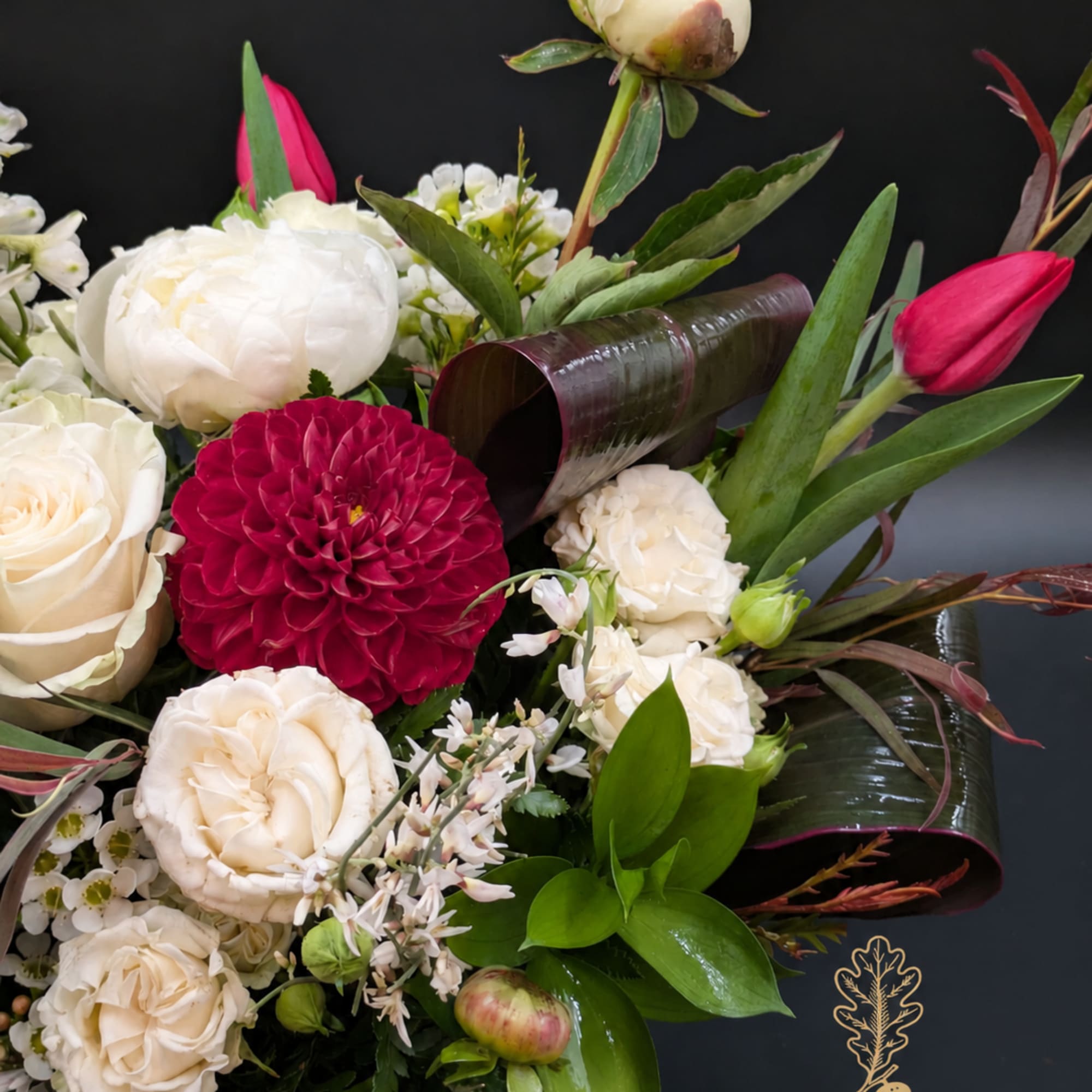 Bouquet of white and deep pink flowers with tulips and dahlias