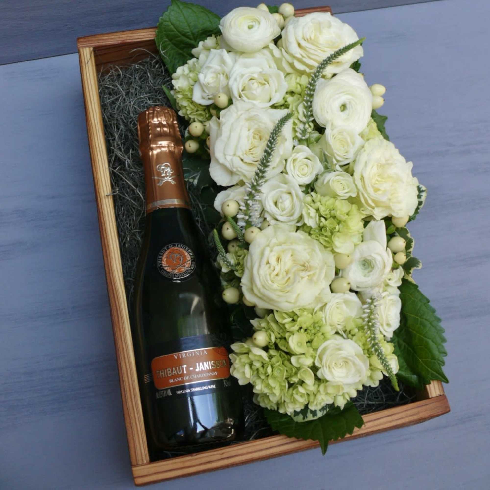 A beautiful wooden gift box, locally hand-crafted from reclaimed wood. A 750ml