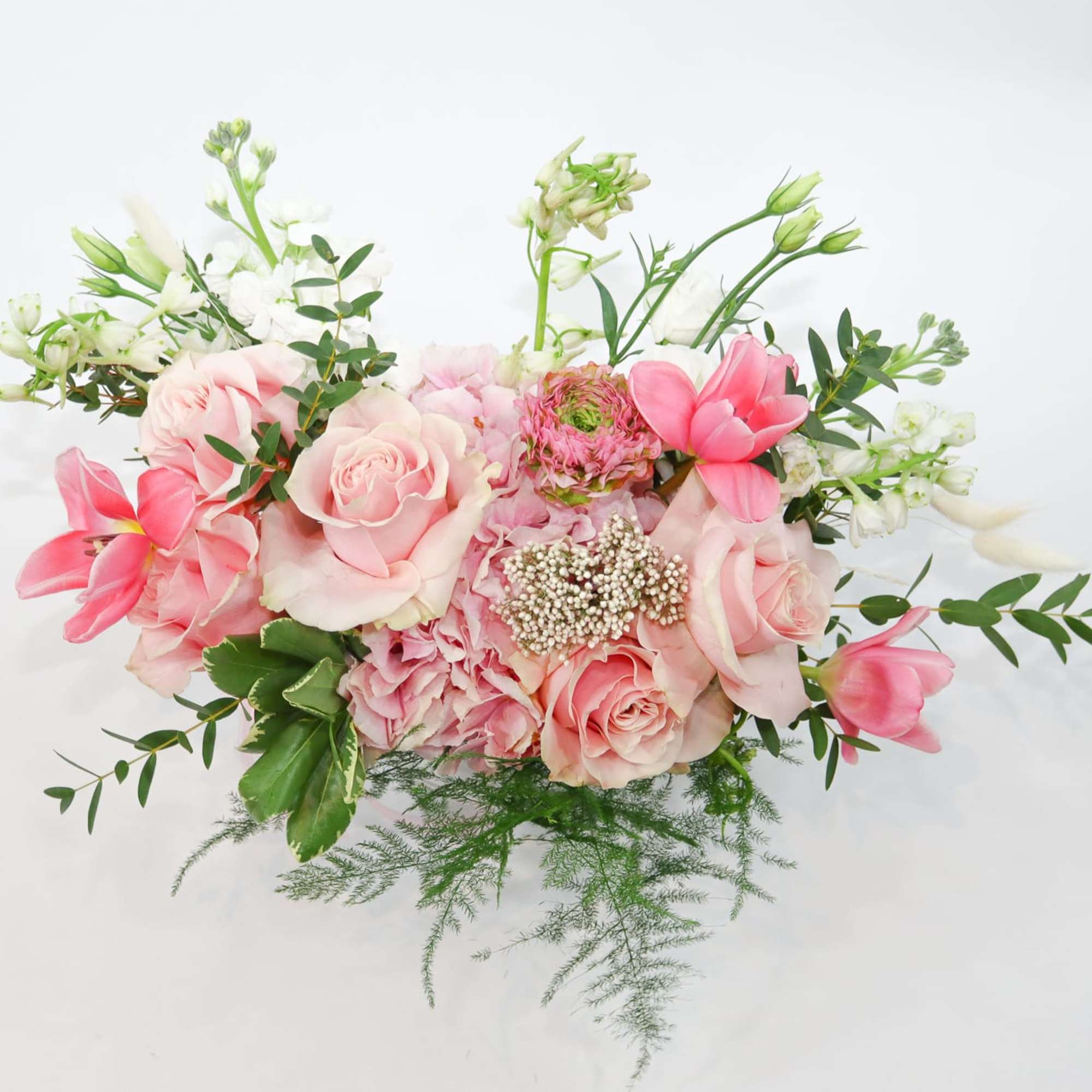 This brilliant arrangement of pink flowers brings some sunshine and vibrant color, photo 2 of 4