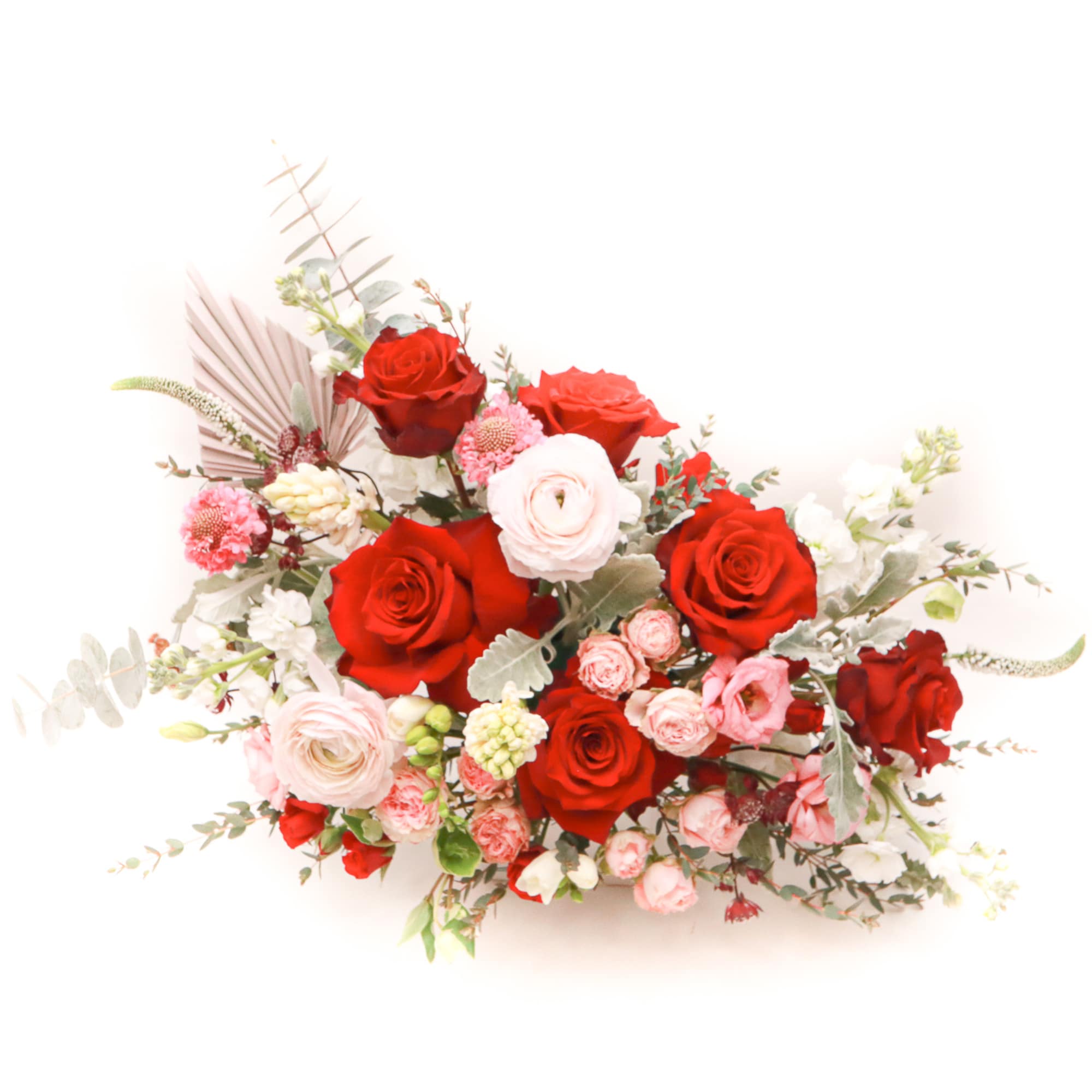 Red and pink rose bouquet with white accent flowers