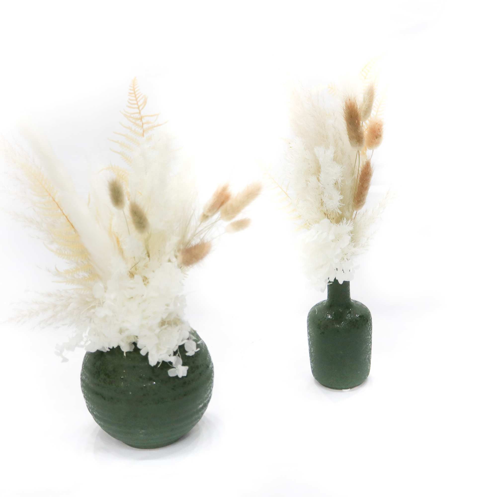 Two dried floral arrangements in dark green vases on a white background, photo 3 of 3