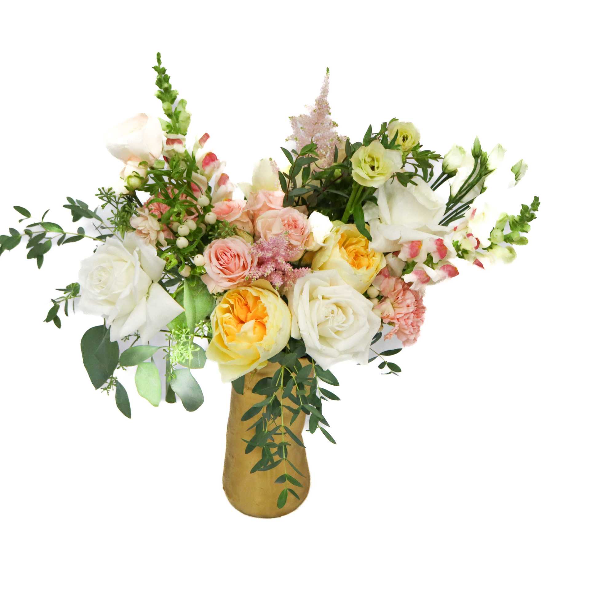 Mixed bouquet of roses, lisianthus, and snapdragons in a gold vase