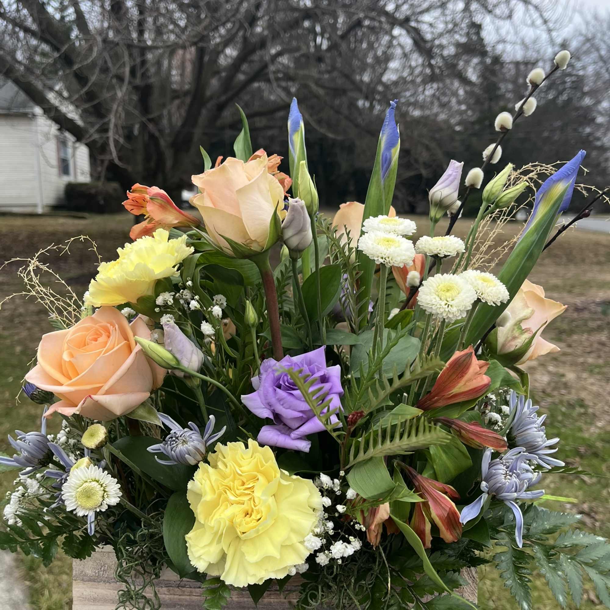 This is a medium height arrangement filled with white and pastel colors., photo 2 of 2