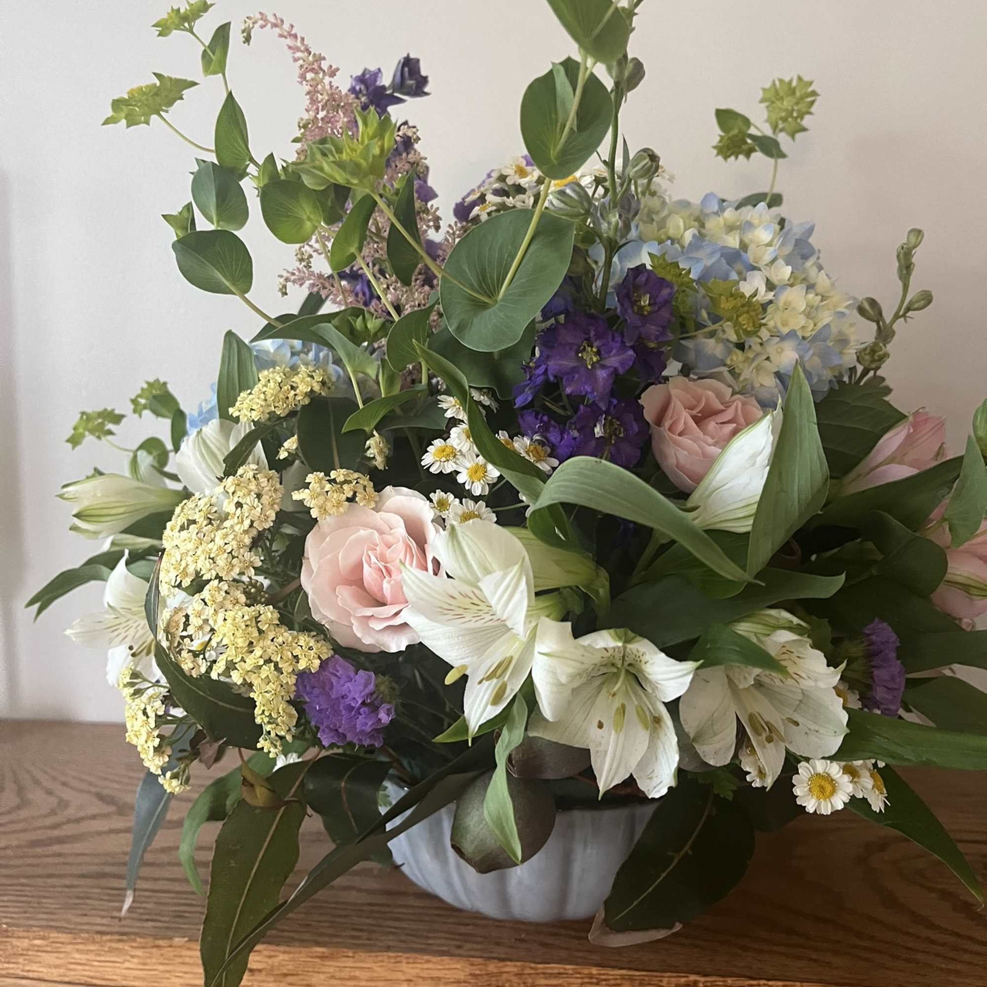 This is a medium height arrangement filled with white and pastel colors., photo 2 of 2