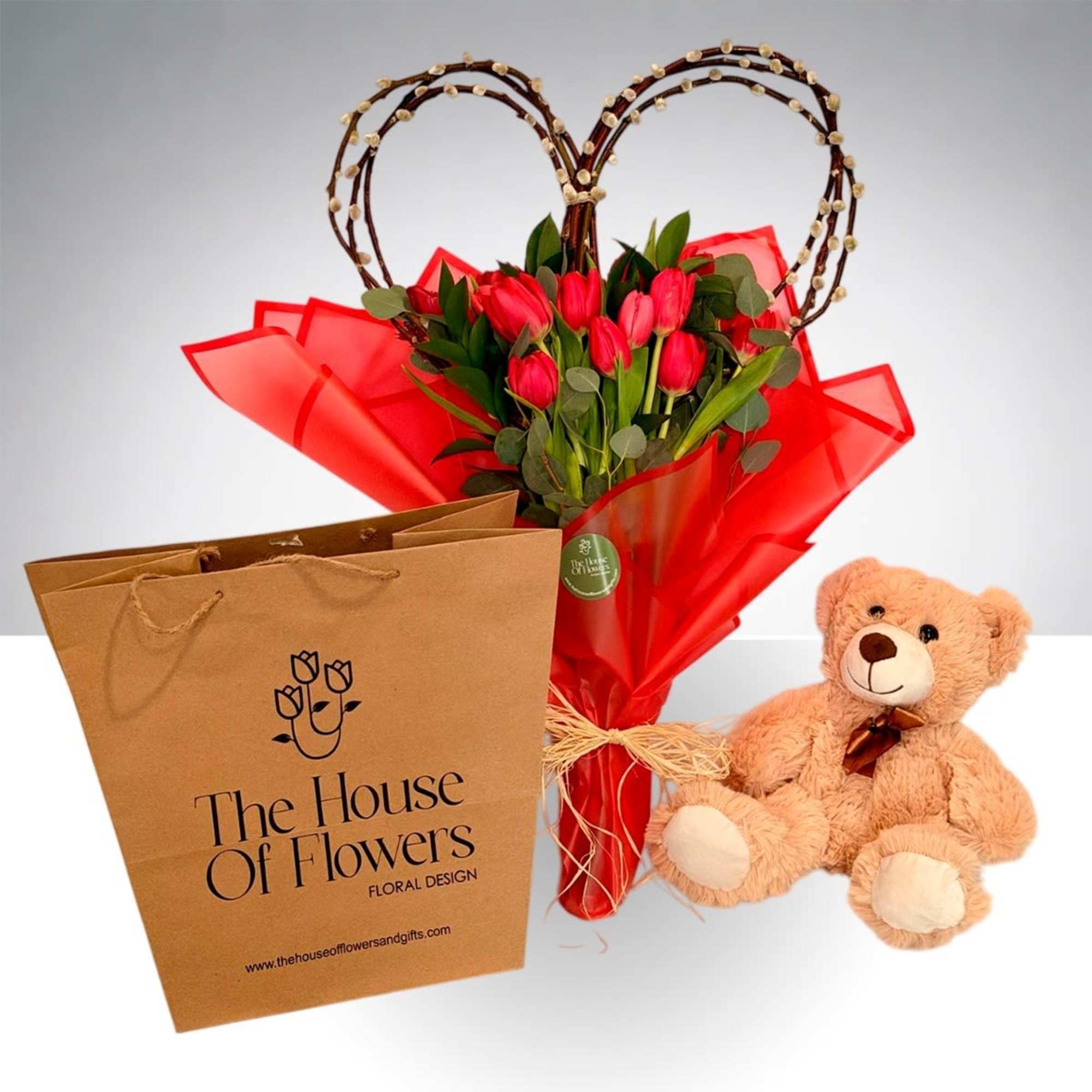 A beautiful bouquet of tulips with a natural heart-shaped base, perfect for
