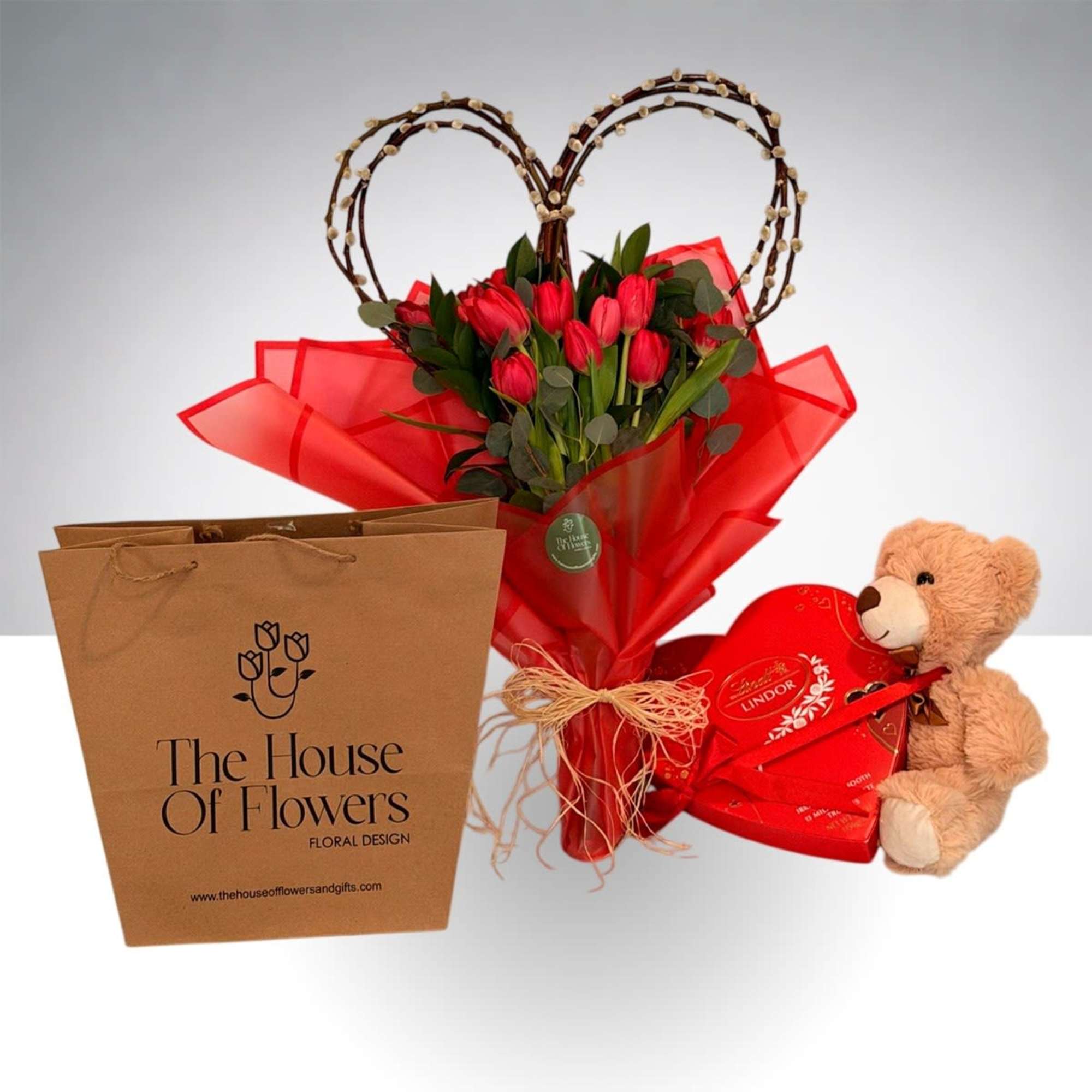 A beautiful bouquet of tulips with a natural heart-shaped base, perfect for