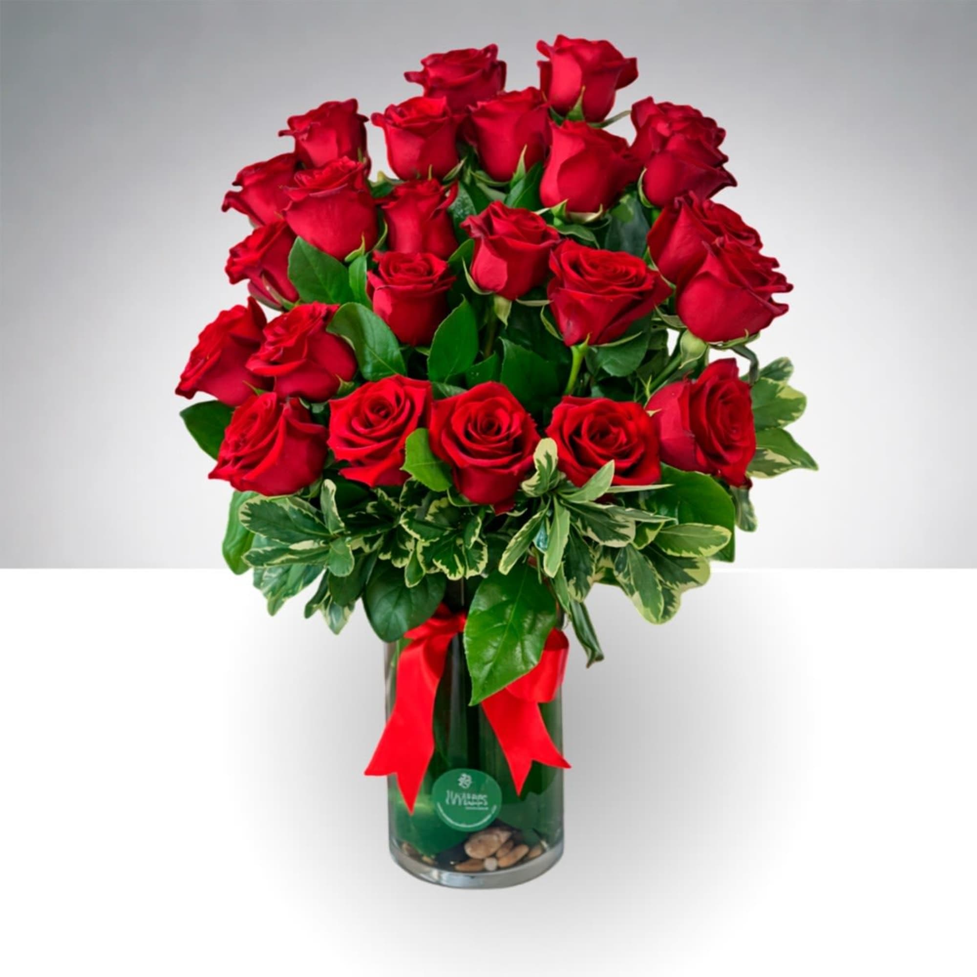Classic 12 Rose Arrangement
A timeless expression of elegance and love.
This handcrafted design