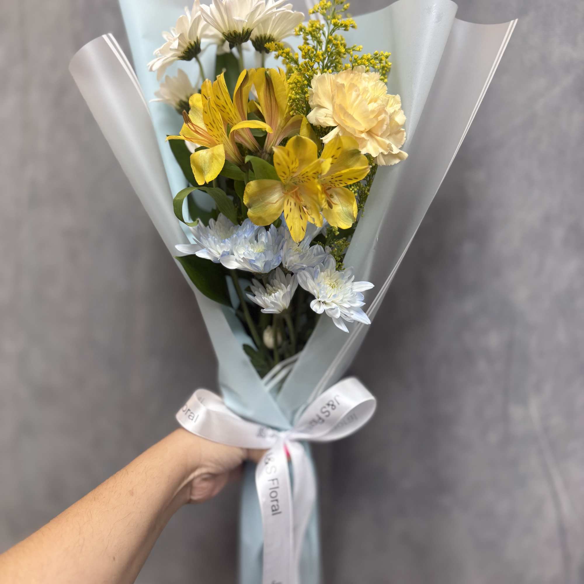 White daisies, with baby blue , carnations and alstroemeria wrapped in soft, photo 2 of 2