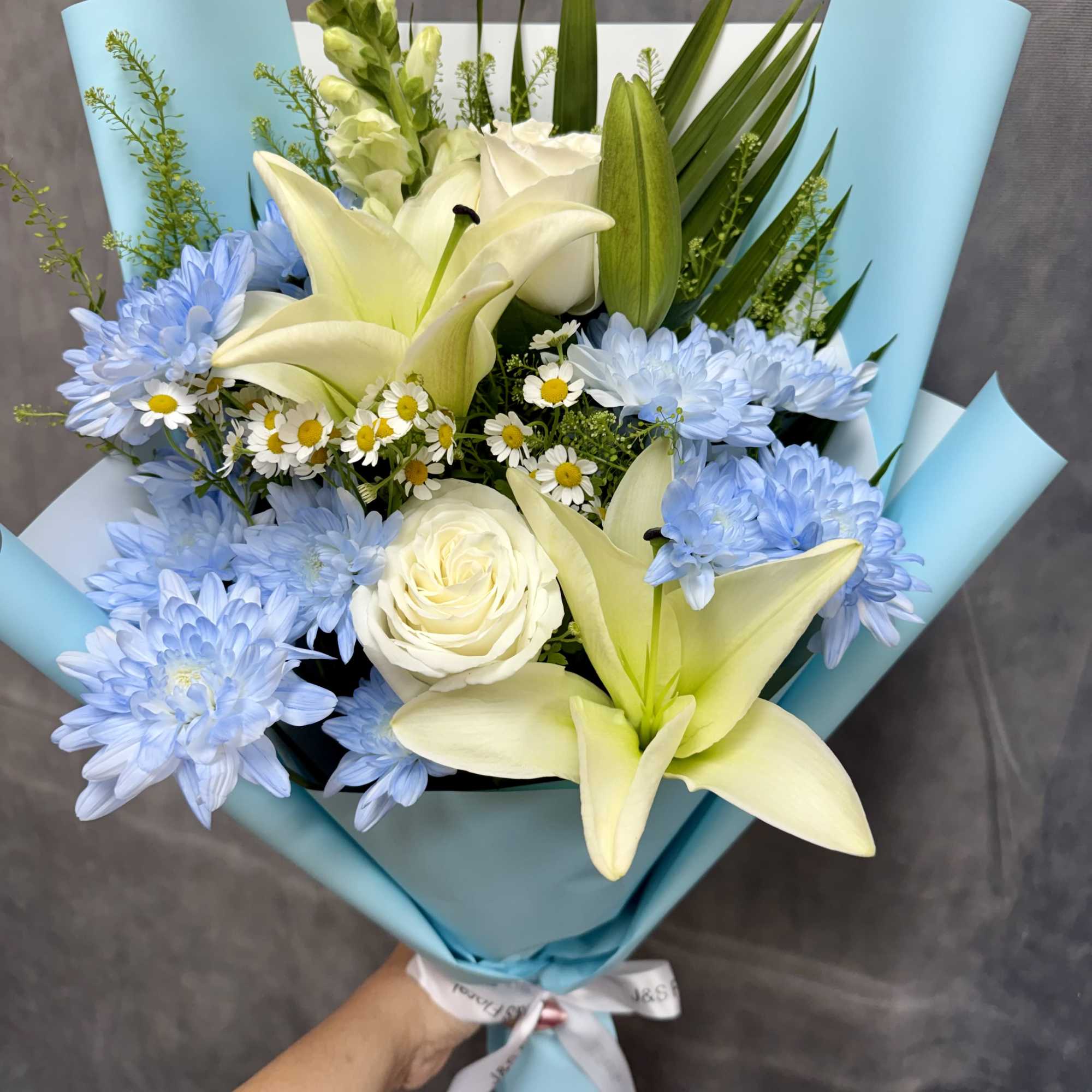  Introducing Our Sweet Baby Boy Bouquet 
A soft and charming hand-tied
