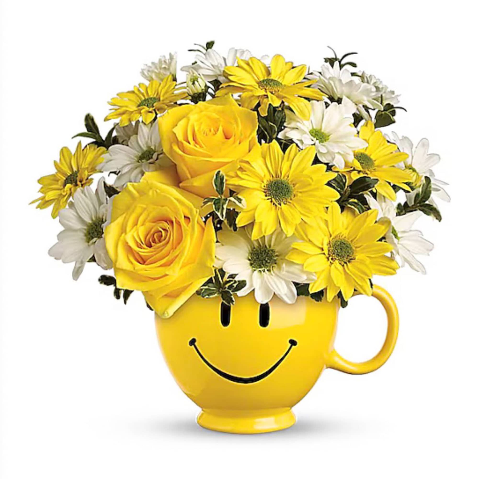 Yellow roses and daisies arranged in a smiley-face mug