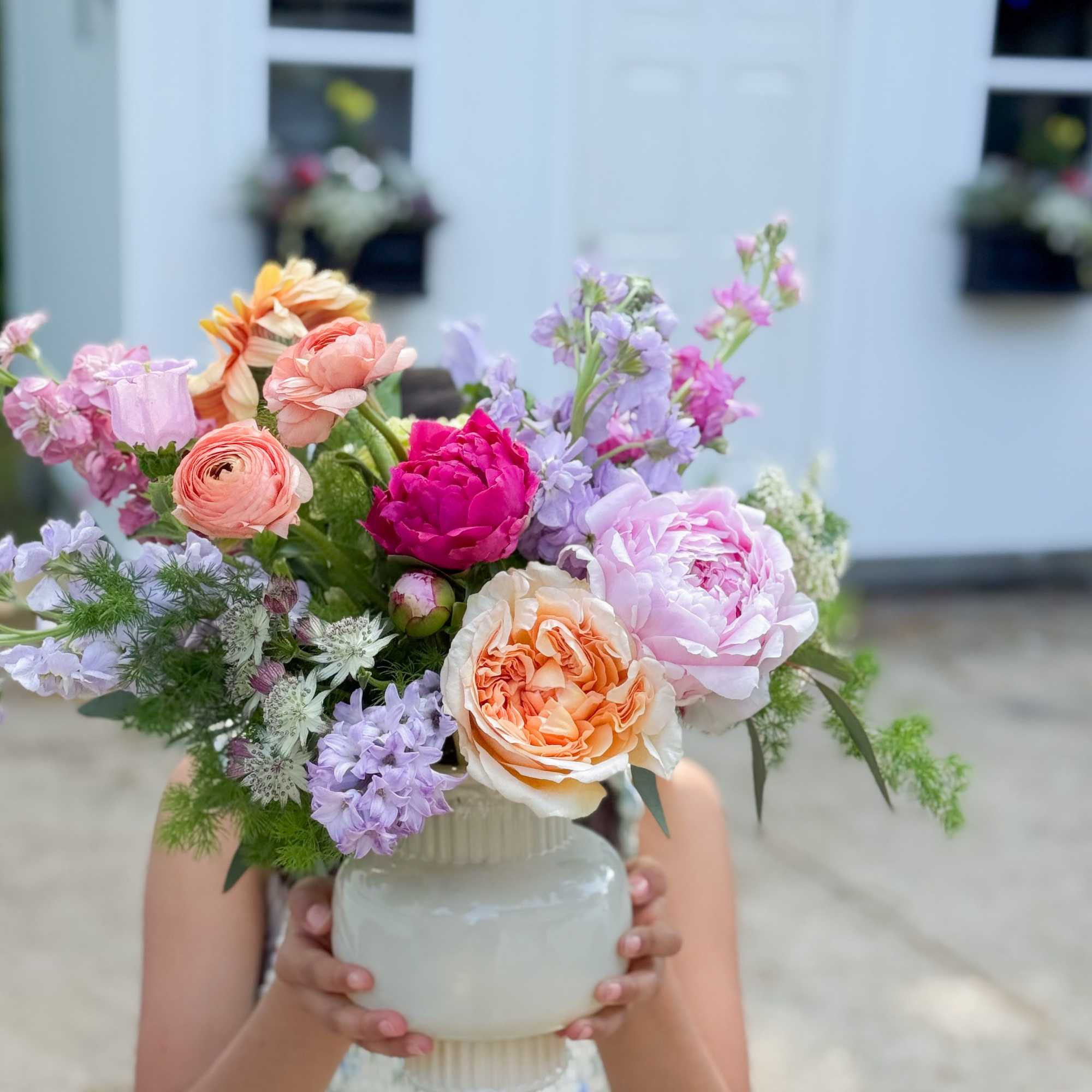 A magnificent display of garden-like blooms. Seasonal flowers designed in a, photo 2 of 2