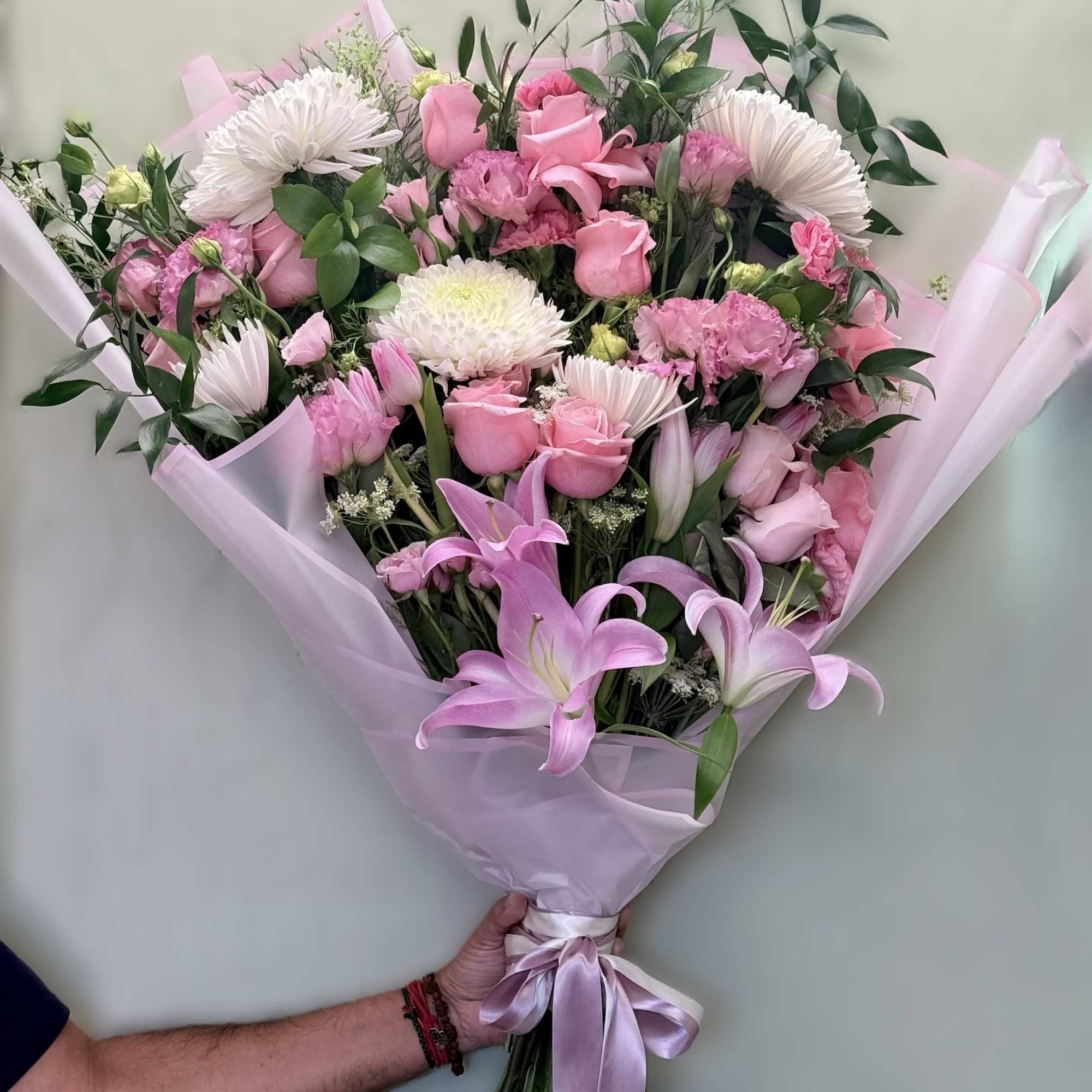 A lavish, hand-tied bouquet that reads like a love letter in soft