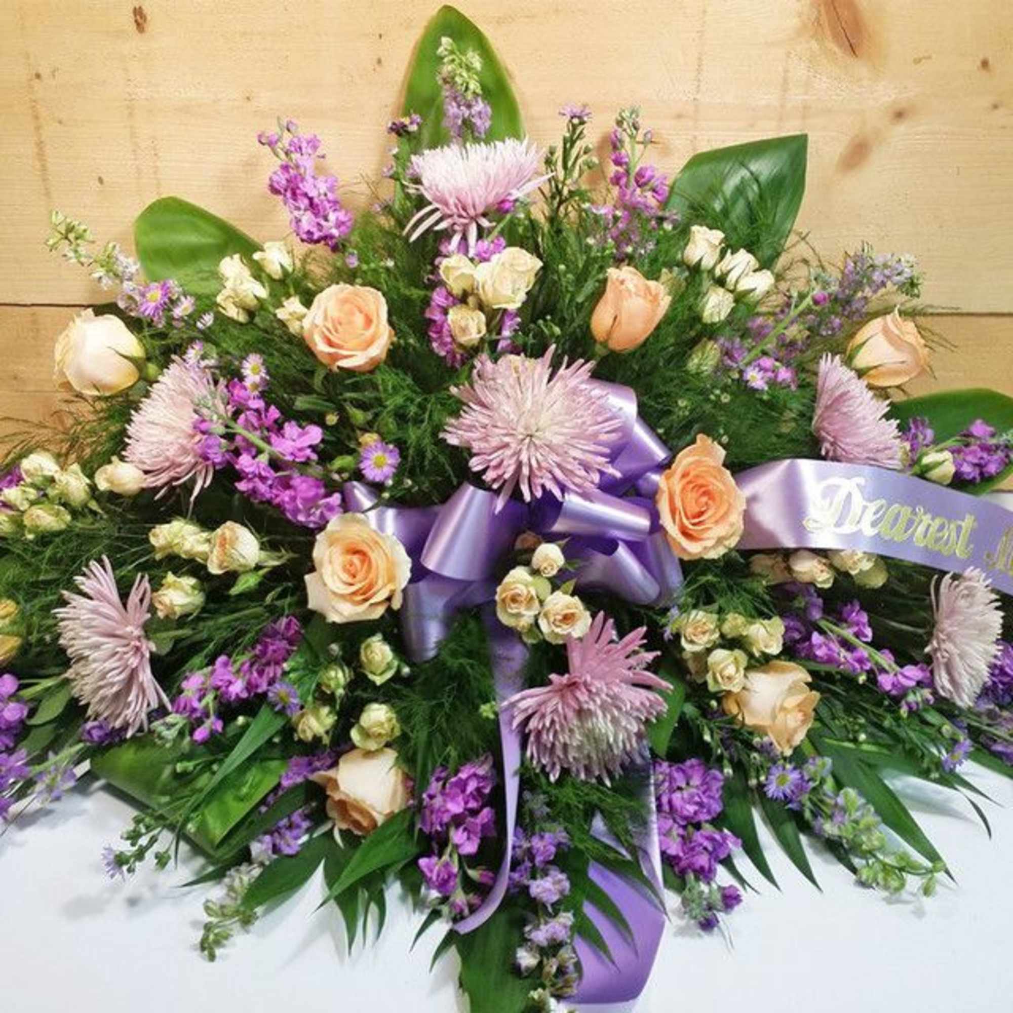 Large purple and peach floral spray with a lavender ribbon, photo 2 of 2