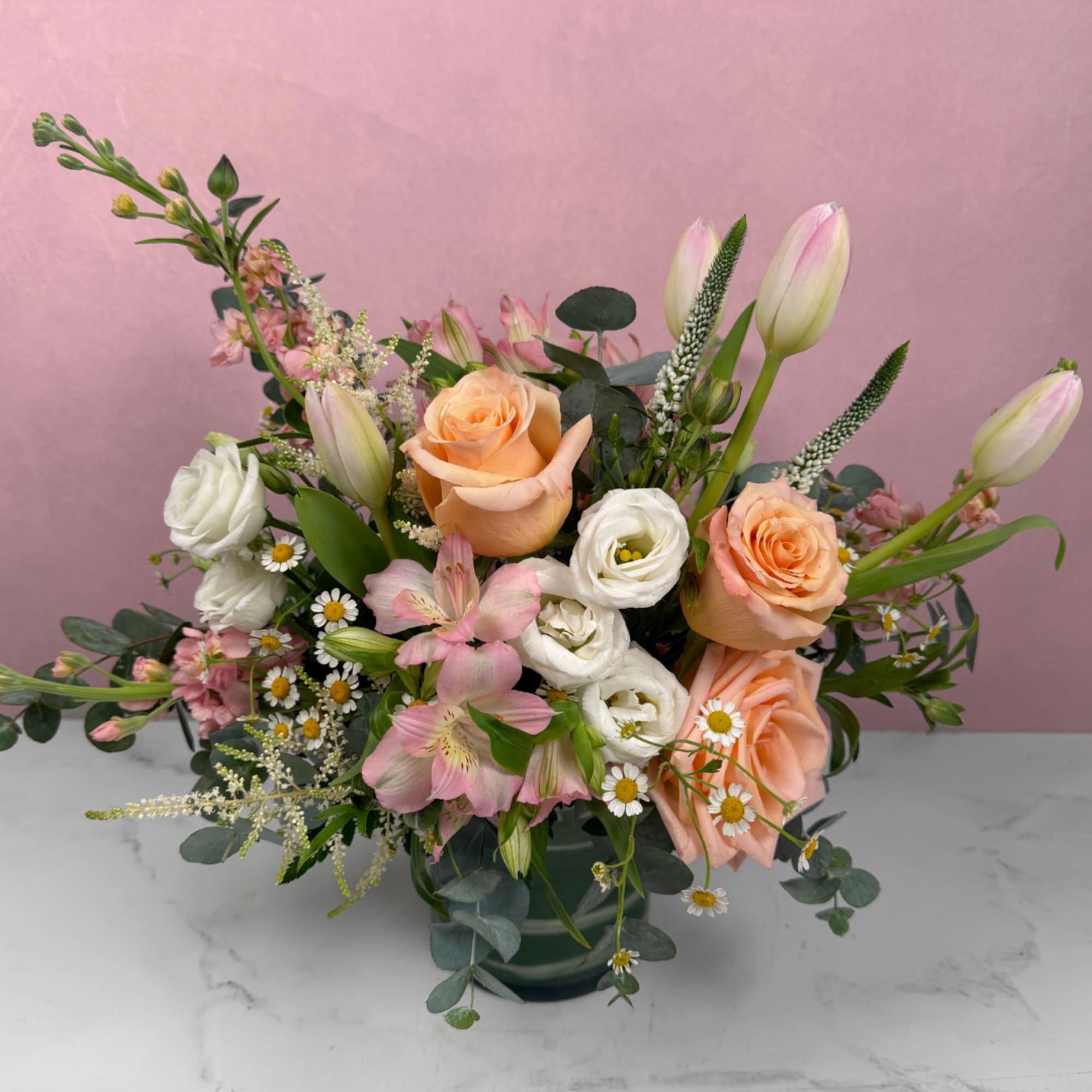 Blush, ivory, and soft pastel tones create a warm and comforting arrangement, photo 4 of 4