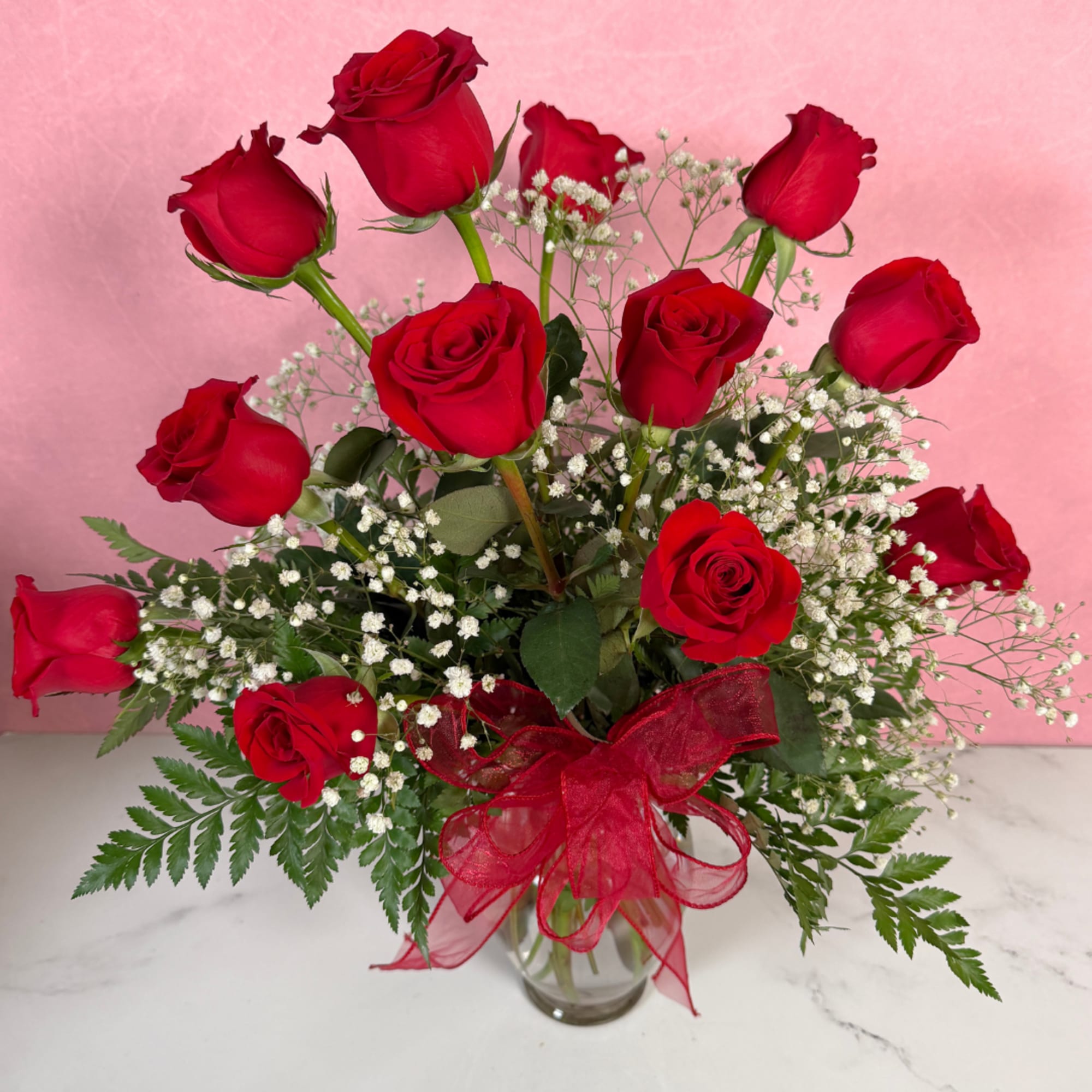 The Classic rendition of One Dozen Red Roses Vased by Savilles Florist, photo 2 of 3