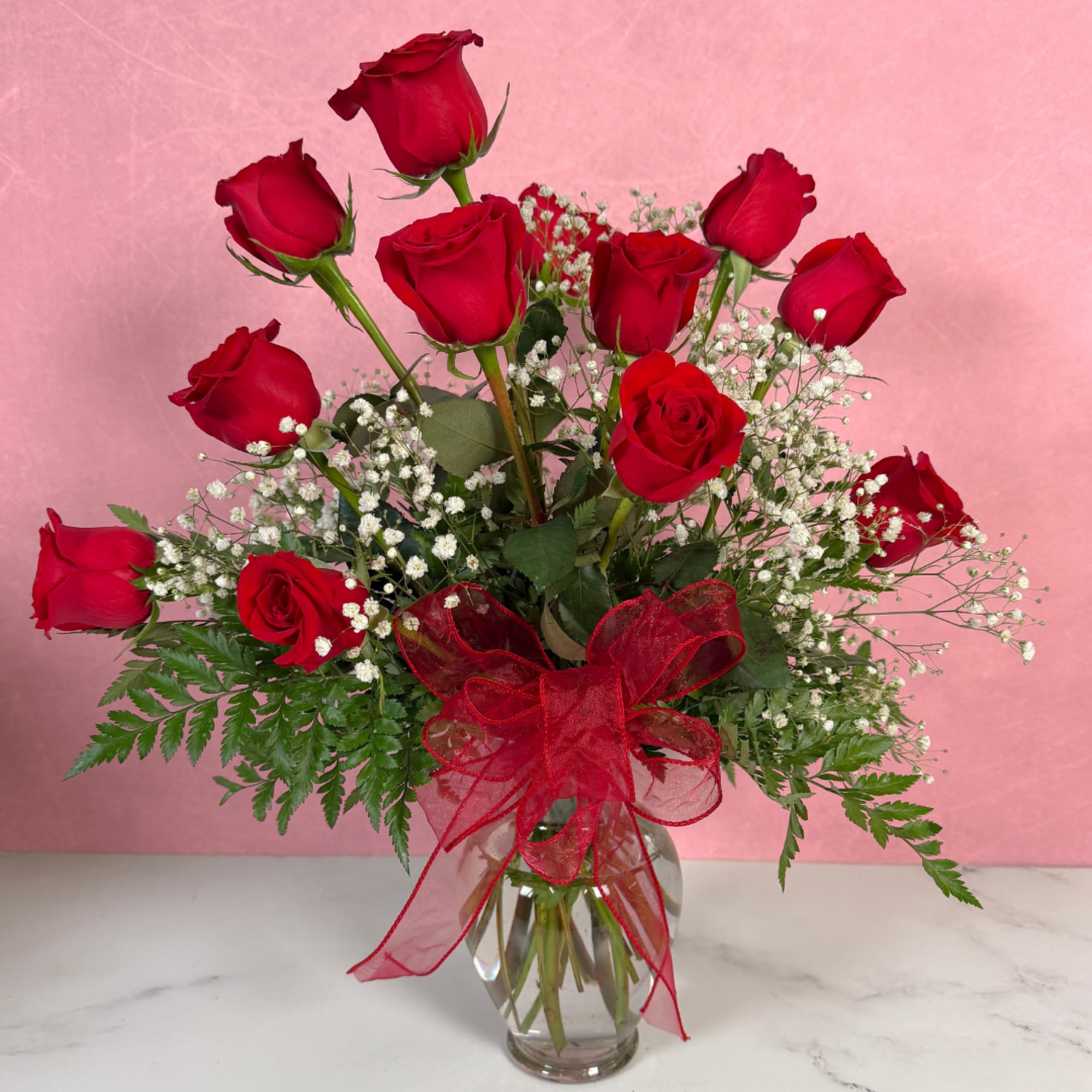 The Classic rendition of One Dozen Red Roses Vased by Savilles Florist, photo 3 of 3