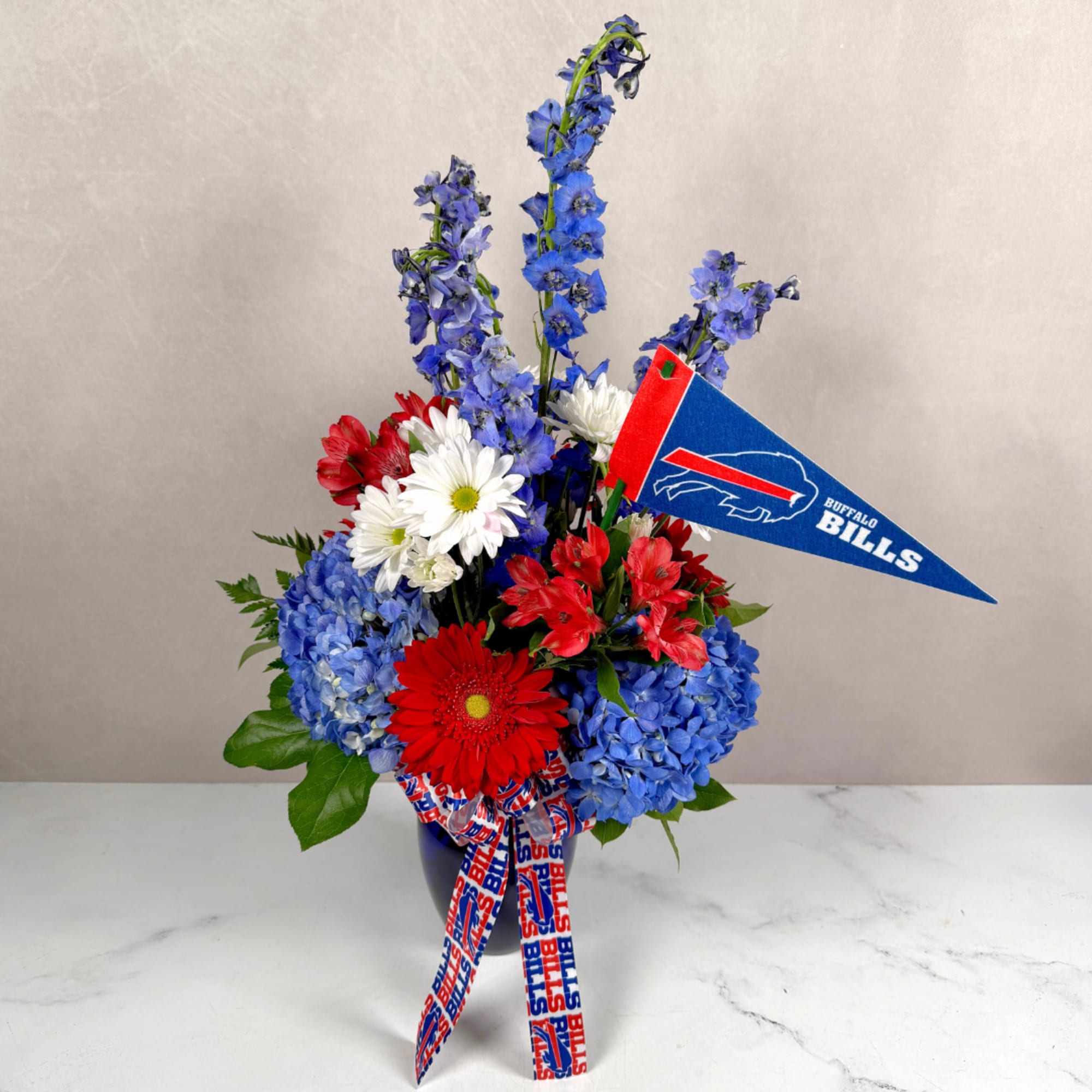 The Go Bills Bouquet by Savilles Florist features bright red alstroemeria, gerbera, photo 3 of 3