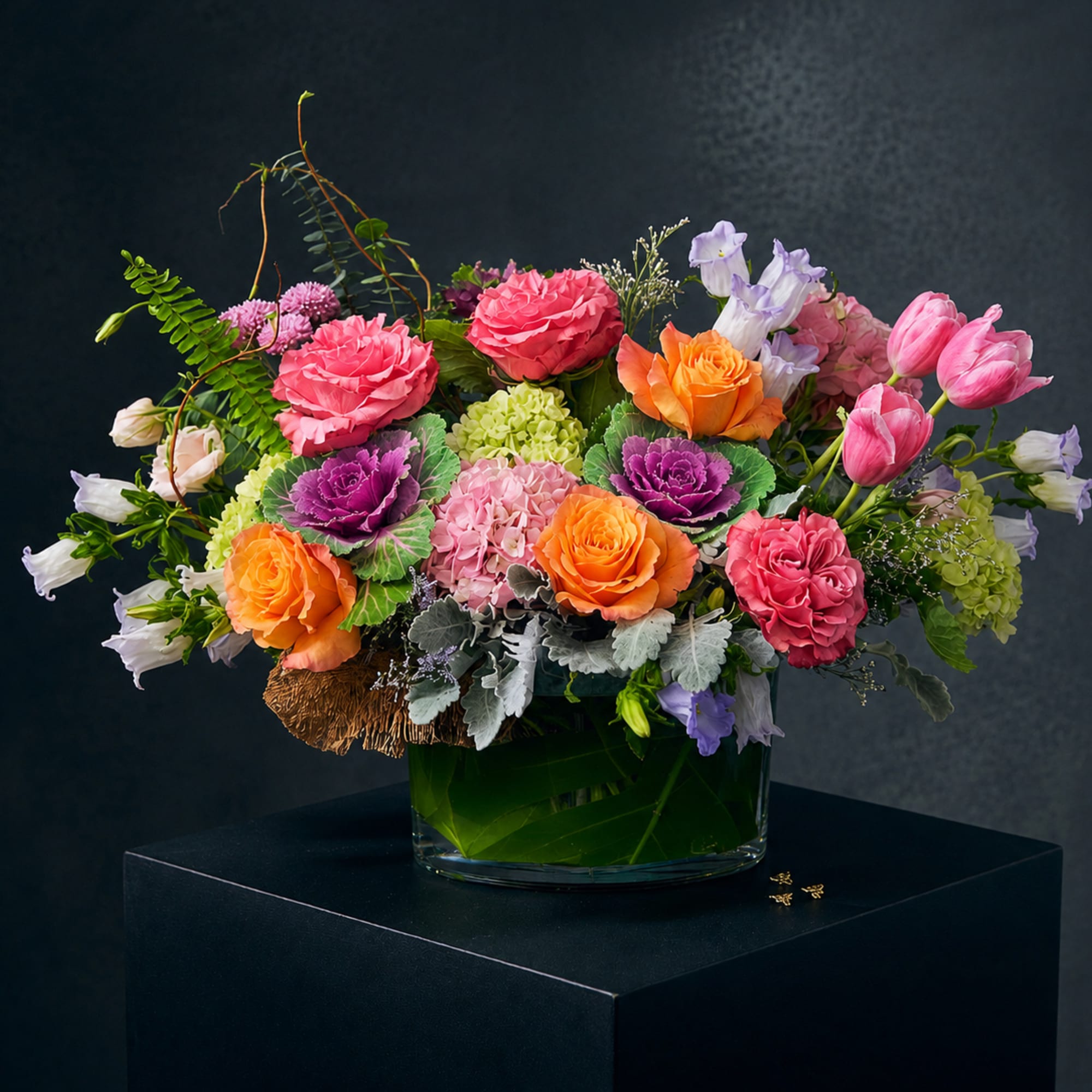 Colorful mixed bouquet in a clear glass vase