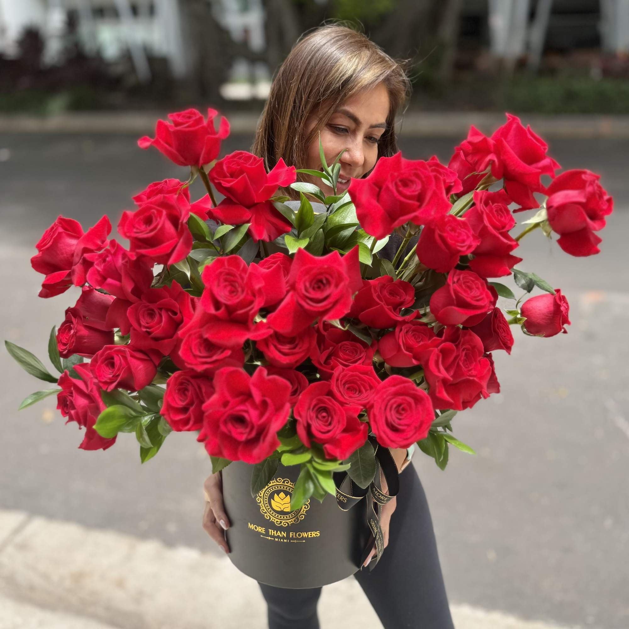 40 reflexed vivid roses cluster arranged in our signature black hatbox with