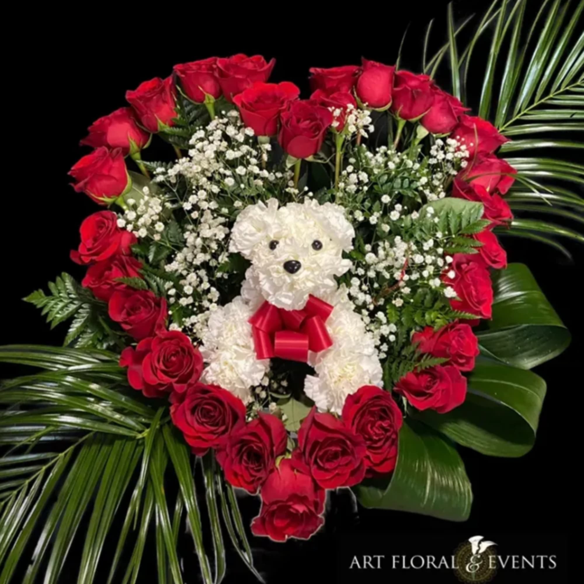 Heart-shaped rose arrangement with a white teddy bear in the center, photo 2 of 2
