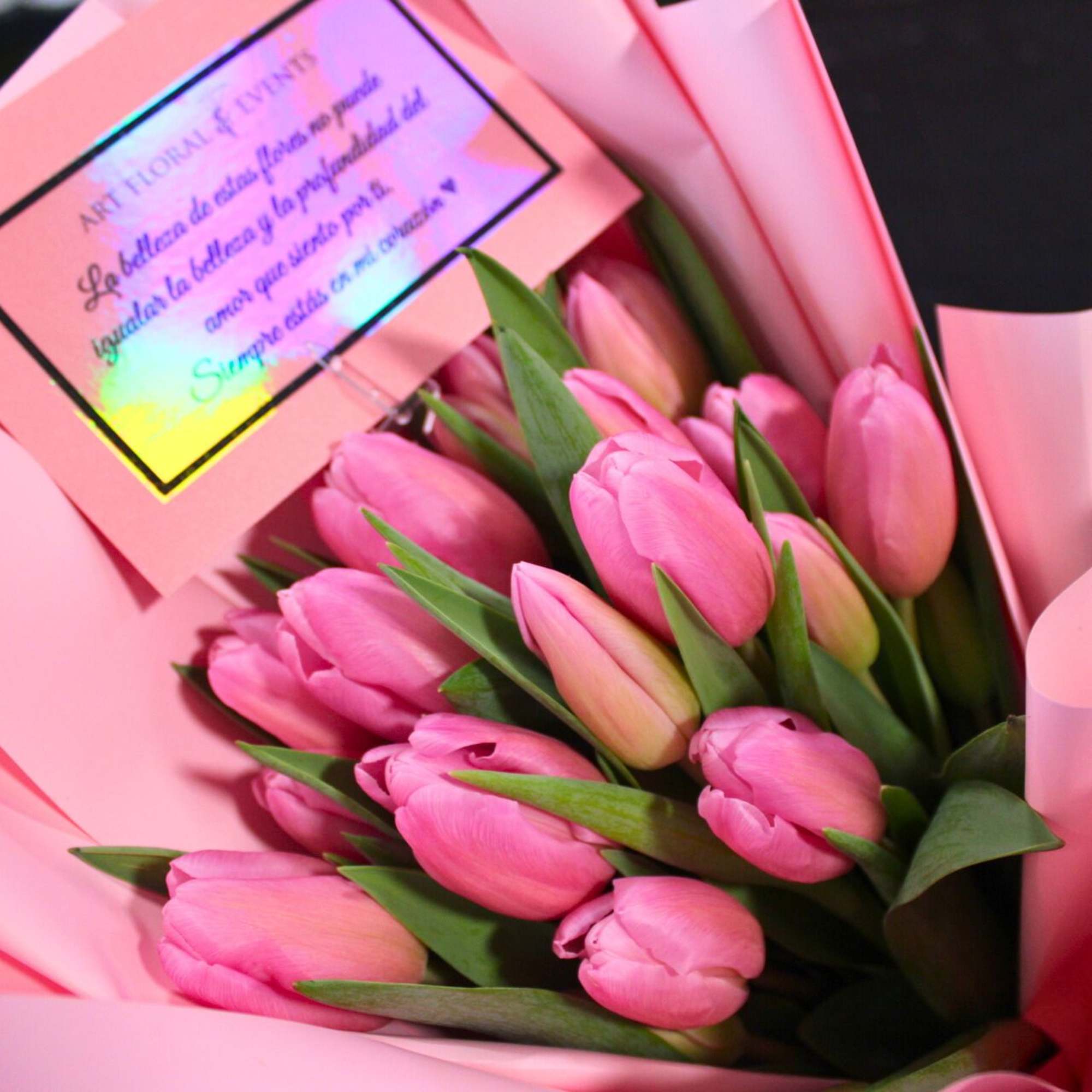 Pink tulip bouquet wrapped in pink paper