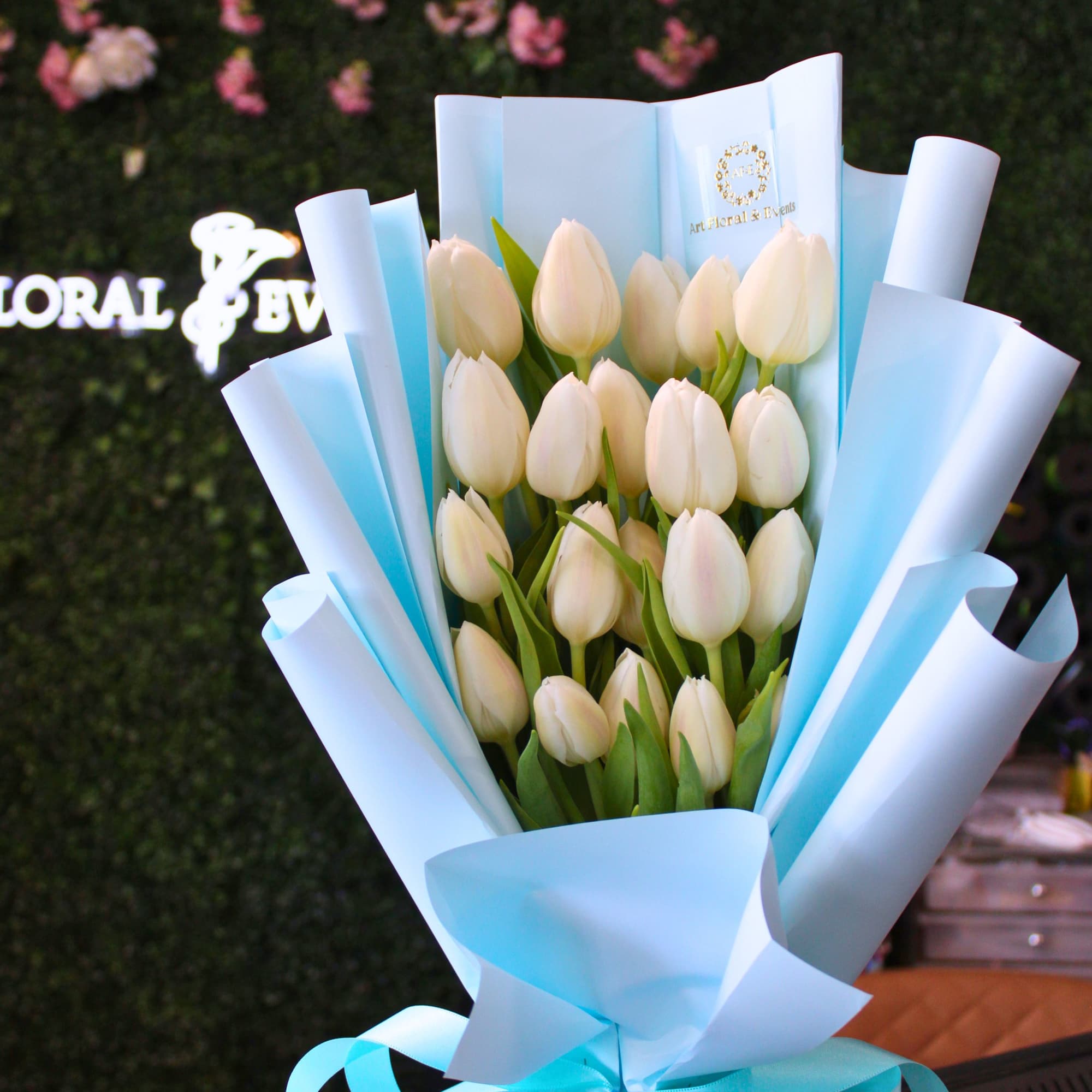 20 Tulips Wrapped in lux waterproof with matching wrapping. 
*VASE INCLUDED*