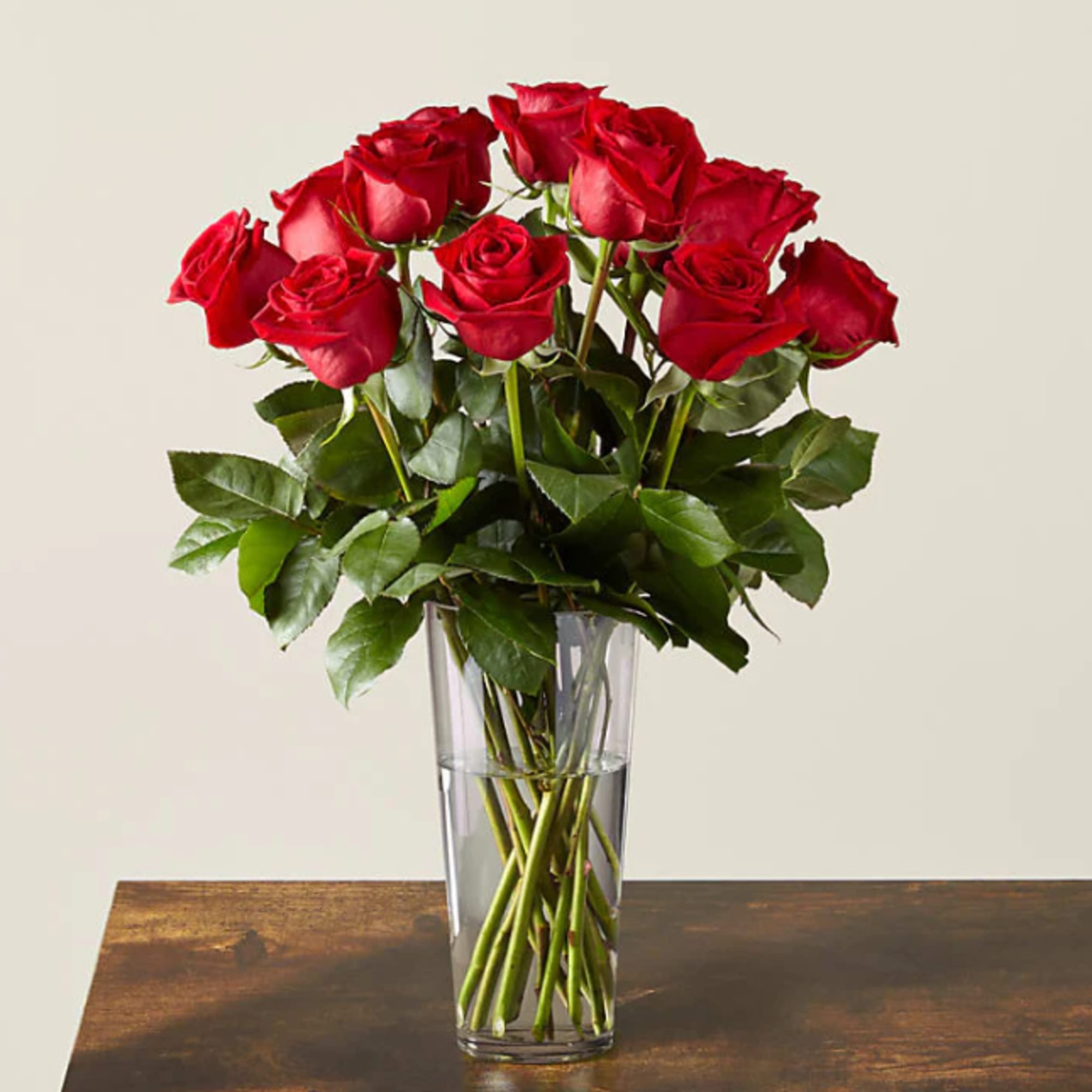 Bouquet of red roses in a clear glass vase