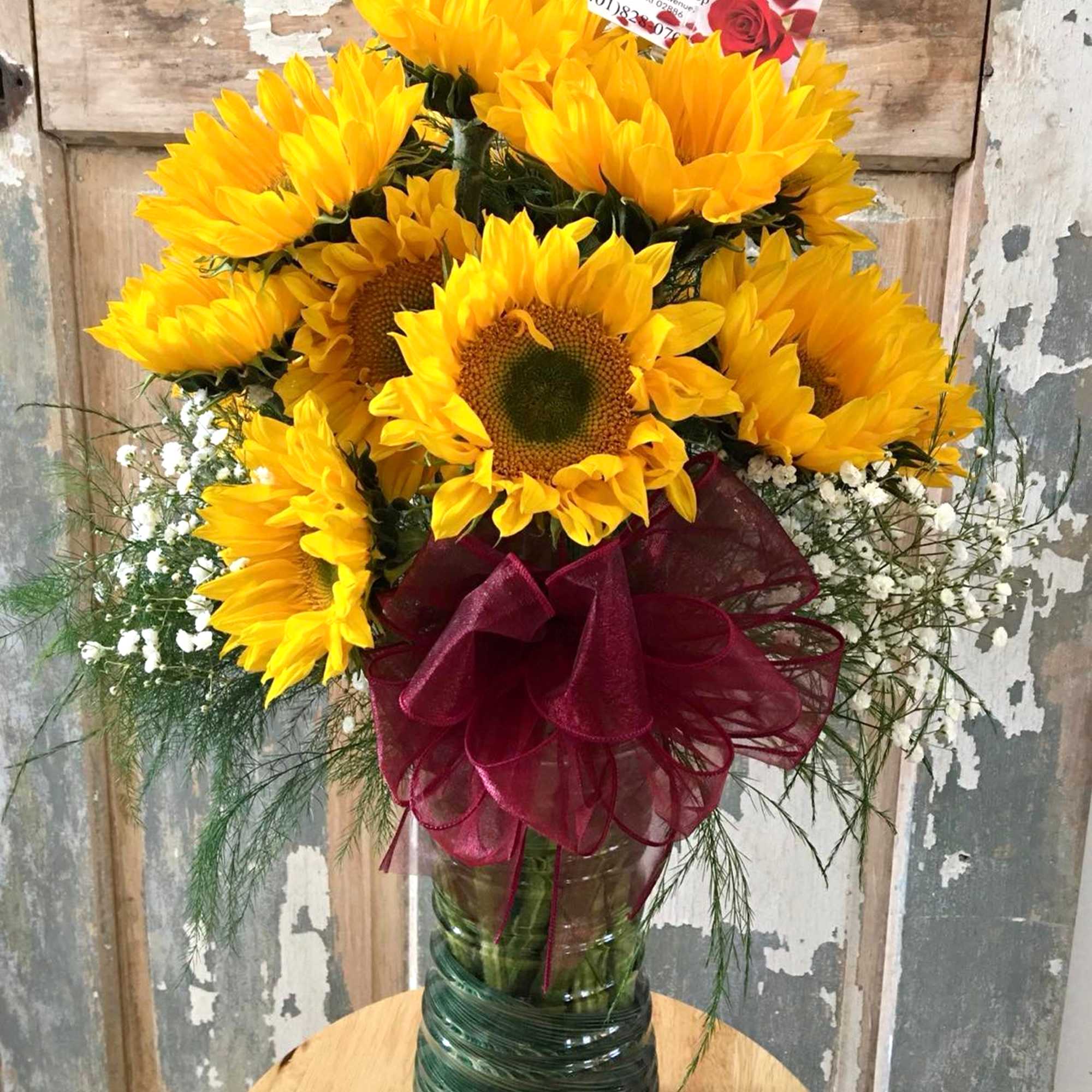 Brighten someone's day with a stunning arrangement featuring a large, clear glass, photo 3 of 3