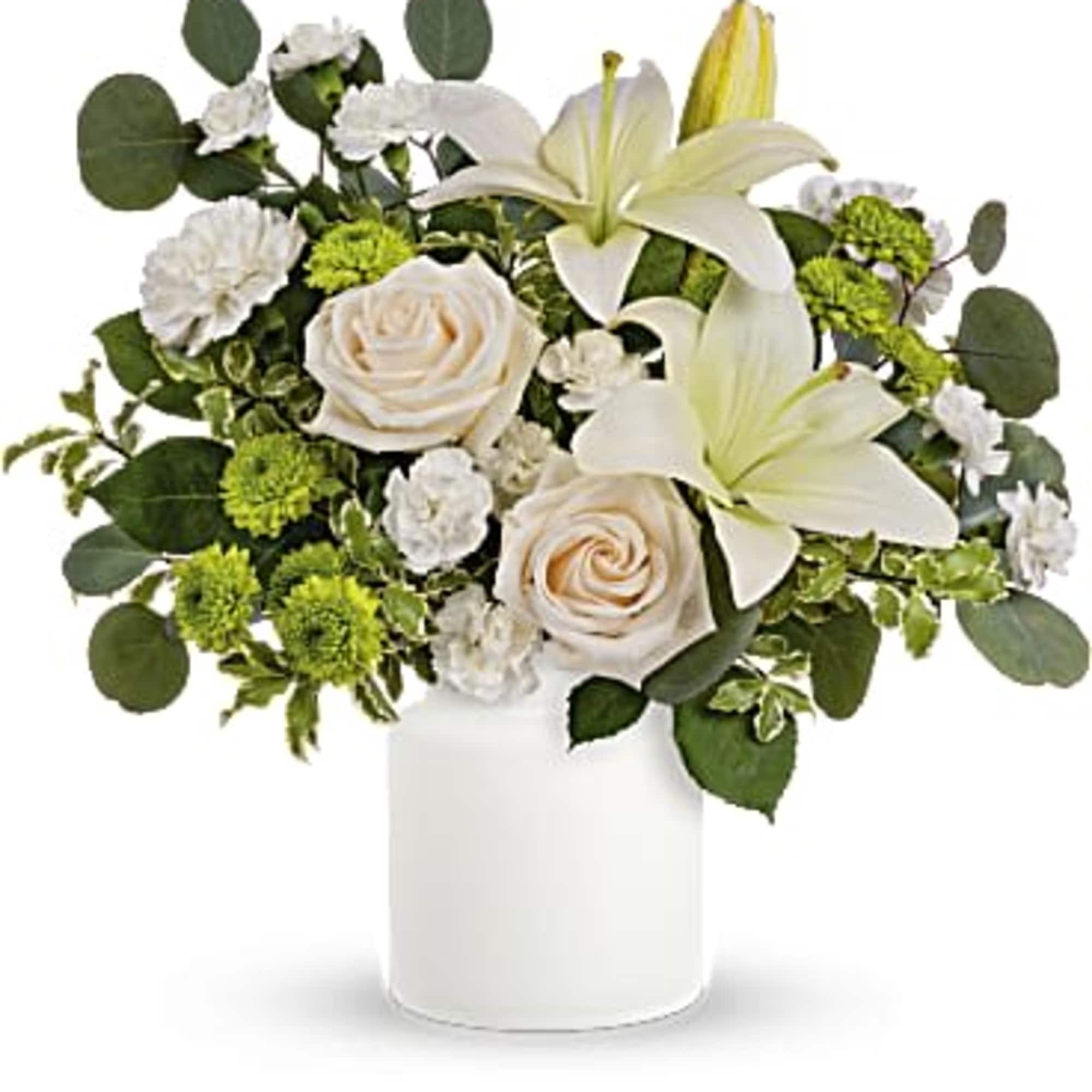 White roses and lilies in a white vase
