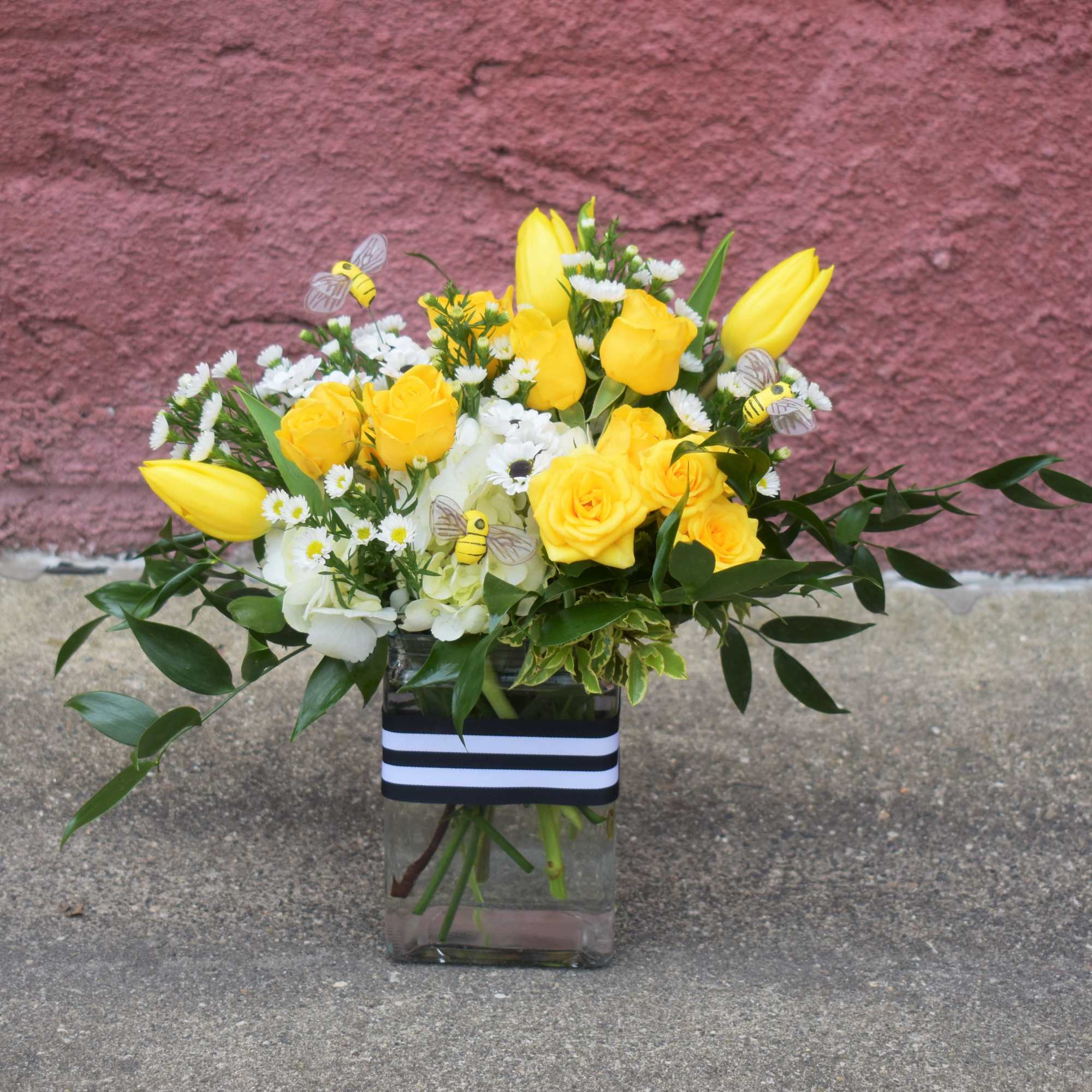 This adorable bouquet is designed in a glass vase with yellow sunflowers, photo 2 of 2