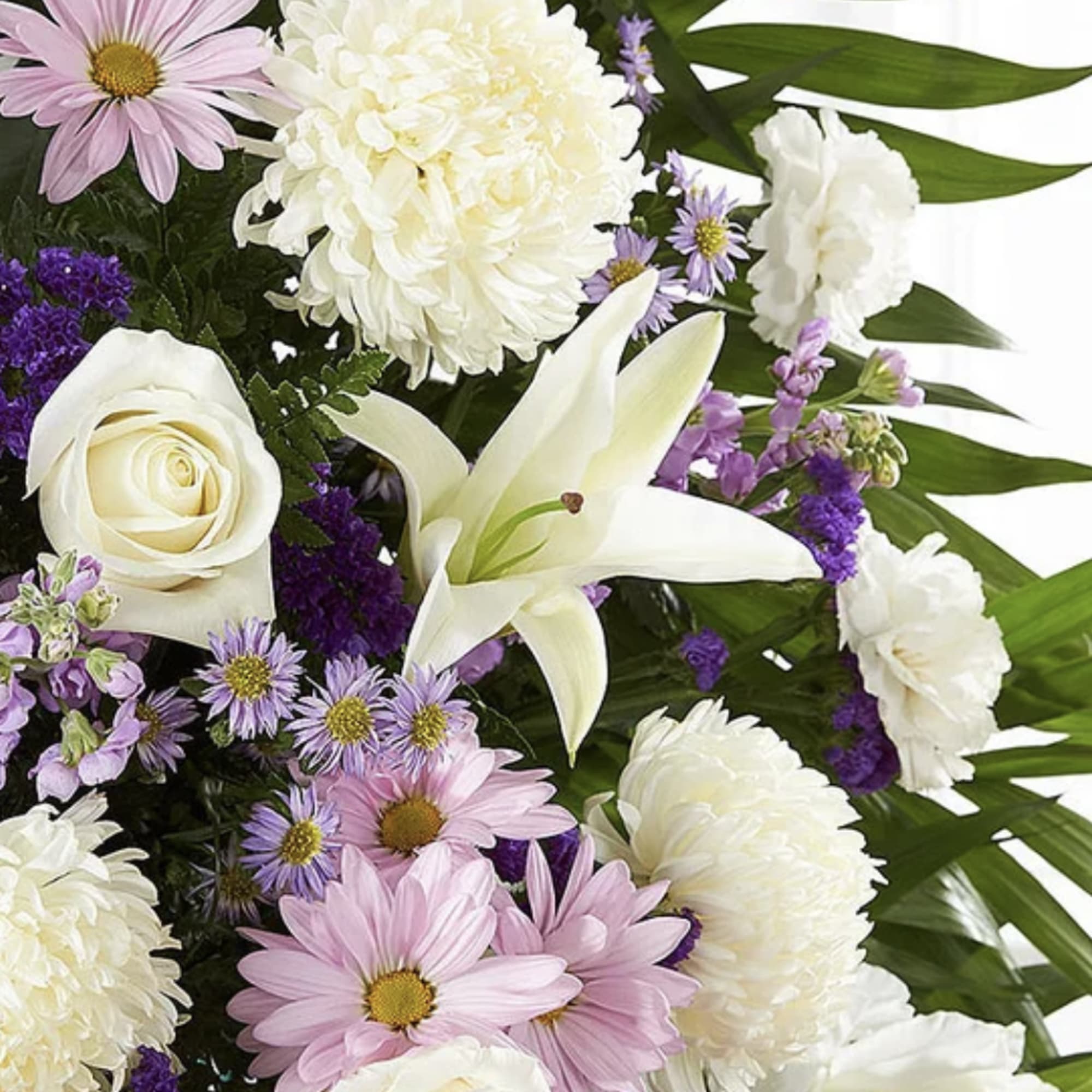 A graceful standing spray designed in soft white and soothing lavender tones, photo 2 of 2