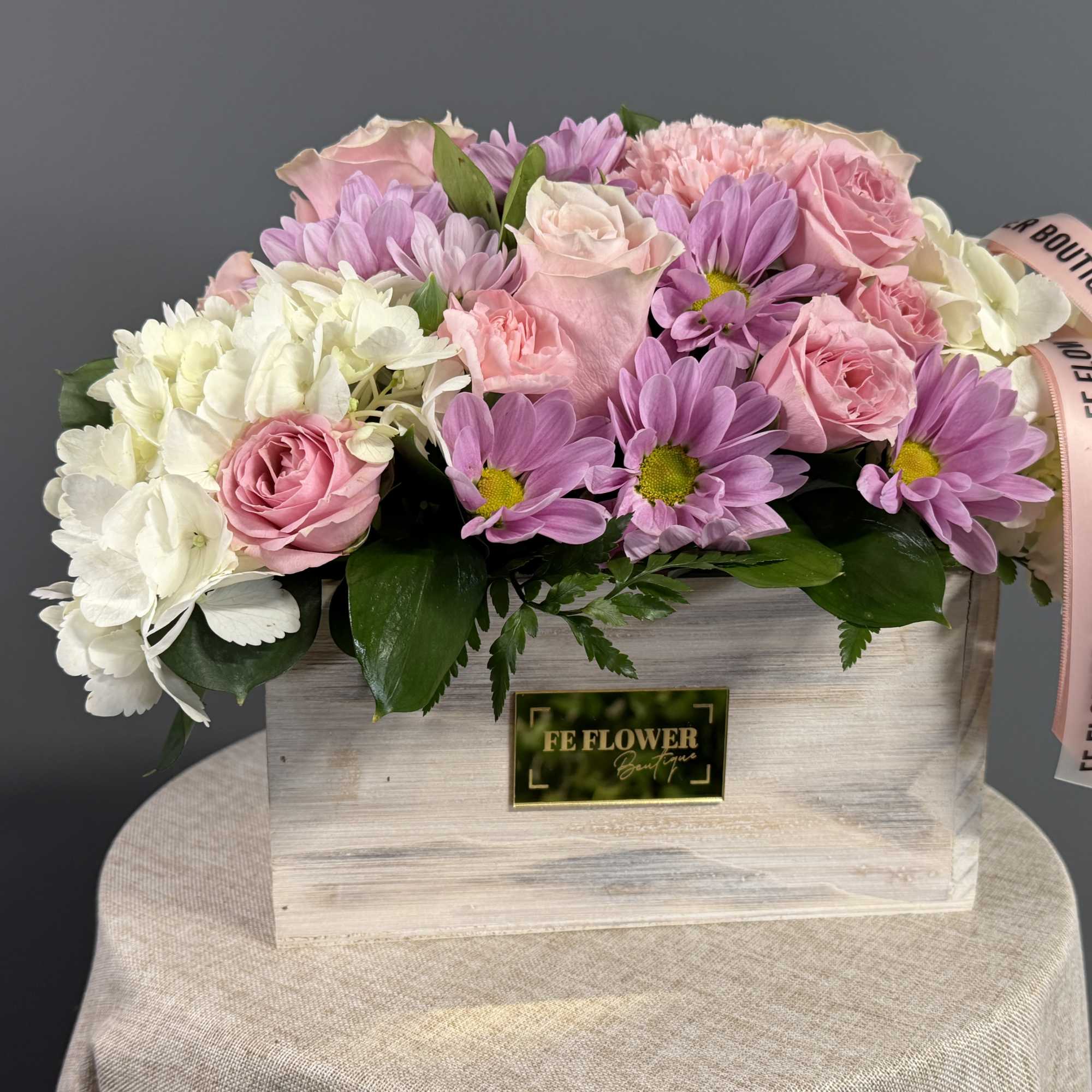 Nestled in a rustic wooden box, delicate lavender chrysanthemums, pristine white roses, photo 5 of 5
