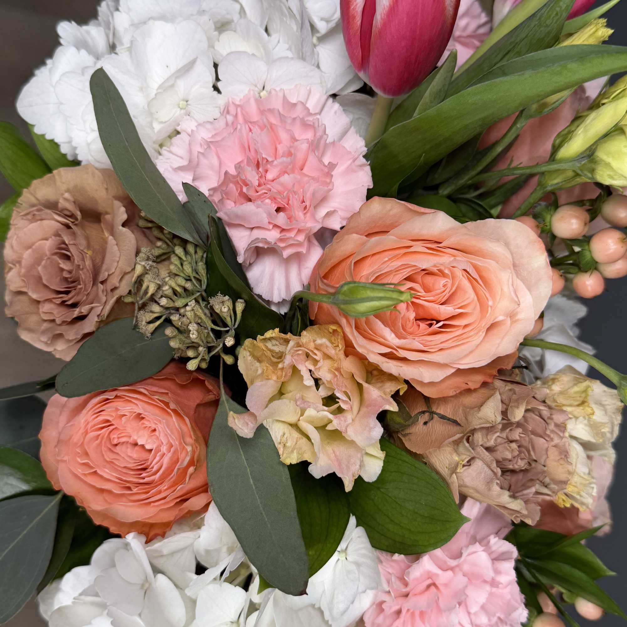 A romantic combination of peach roses, pink tulips, and delicate textures, designed, photo 3 of 4