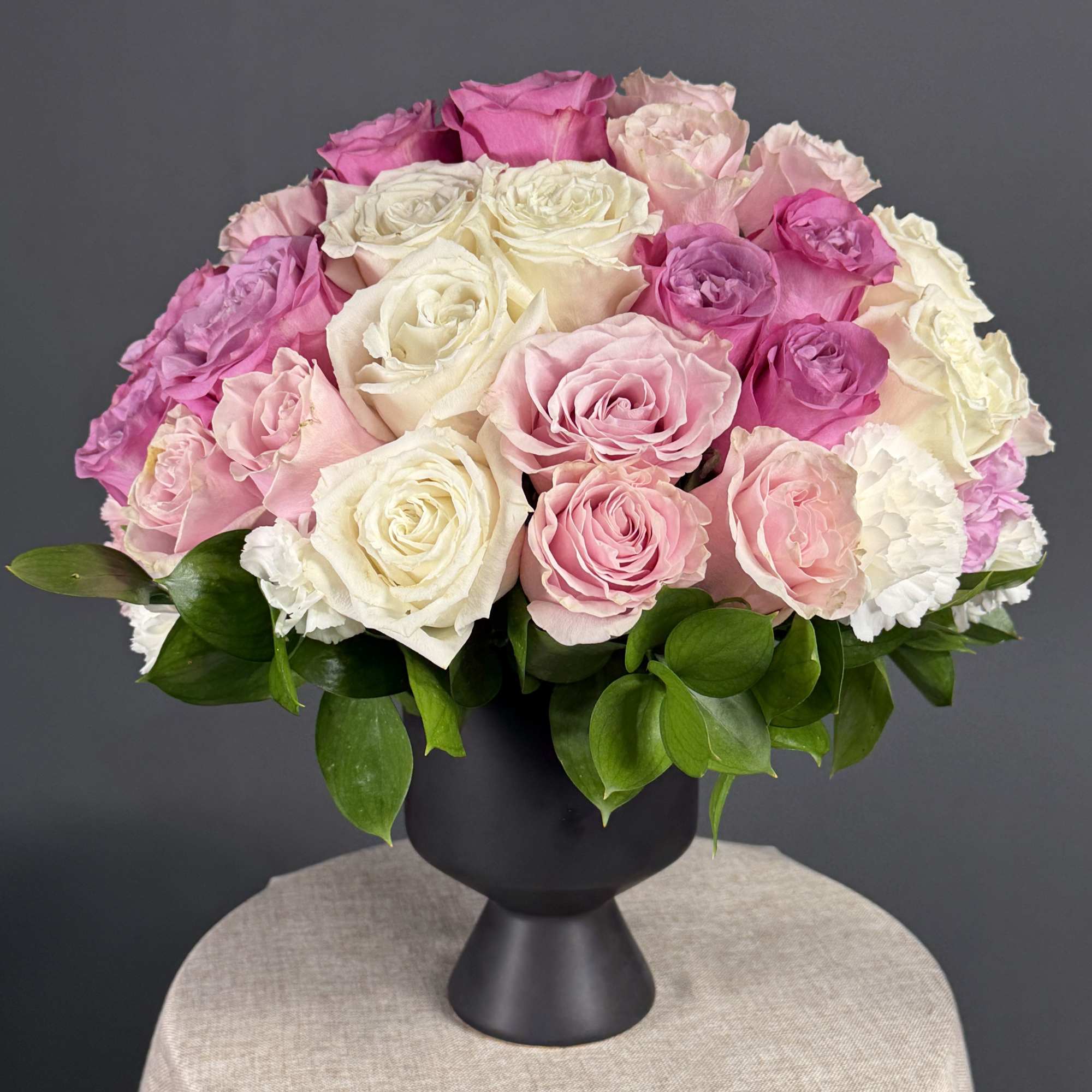 A lush dome of blush pink, hot pink, creamy white and soft
