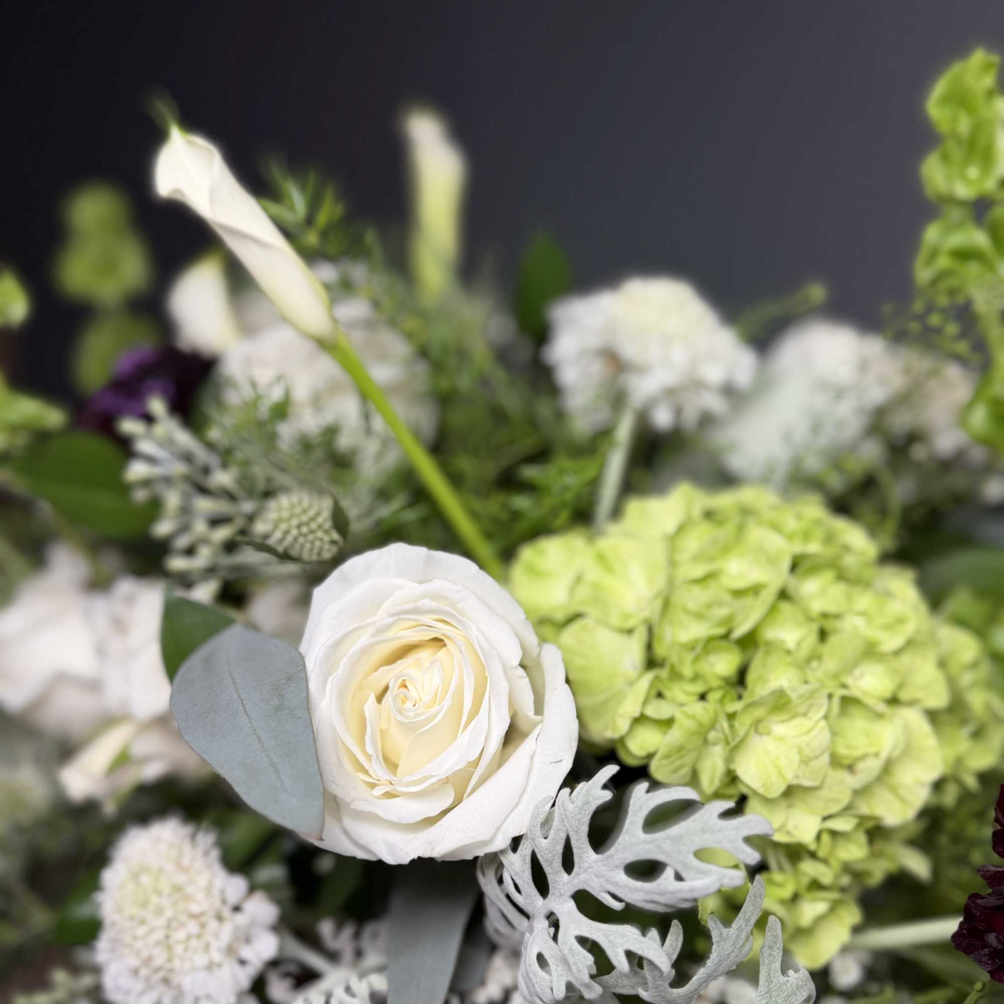 A naturally refined arrangement that blends soft whites and fresh greens for, photo 2 of 5