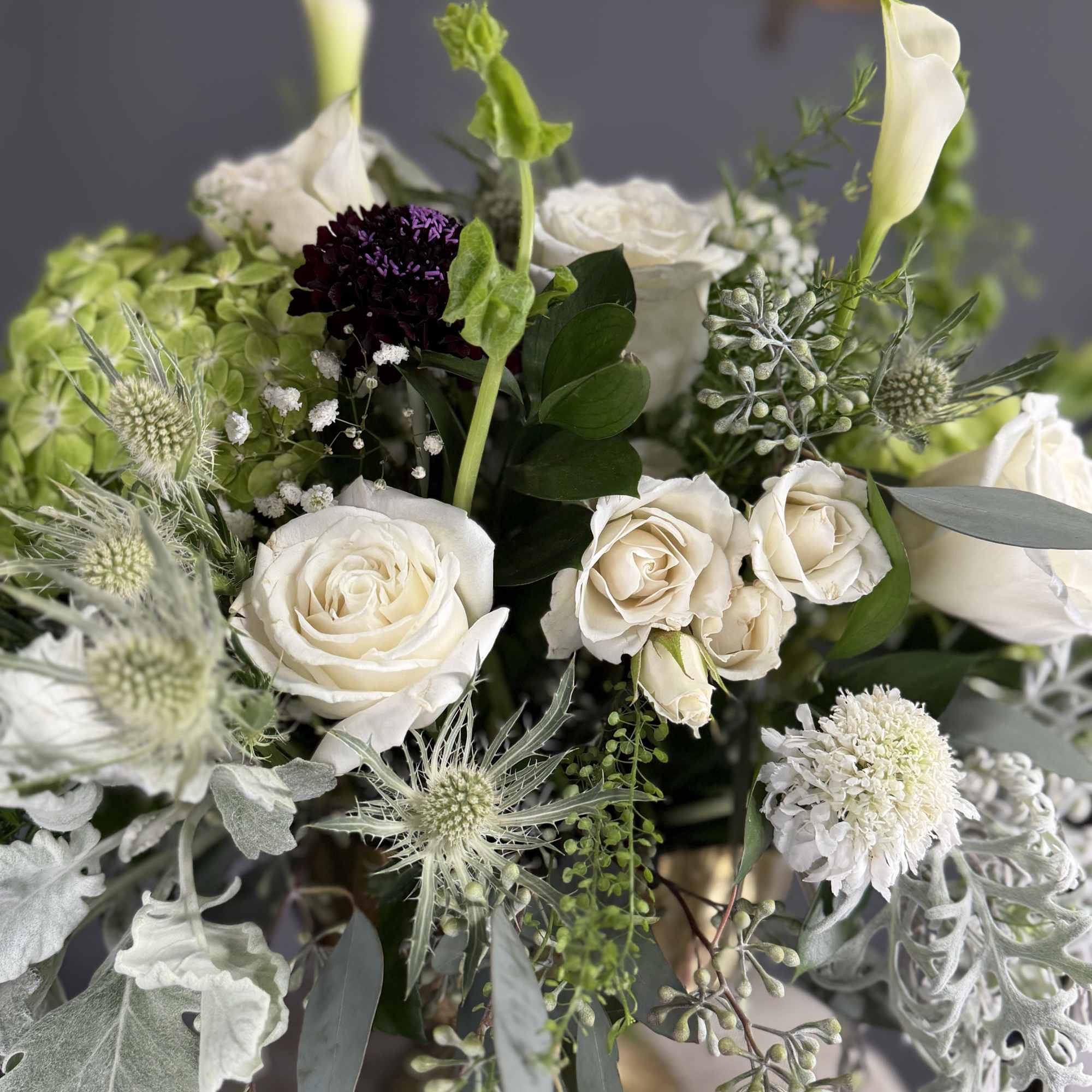 A naturally refined arrangement that blends soft whites and fresh greens for, photo 3 of 5