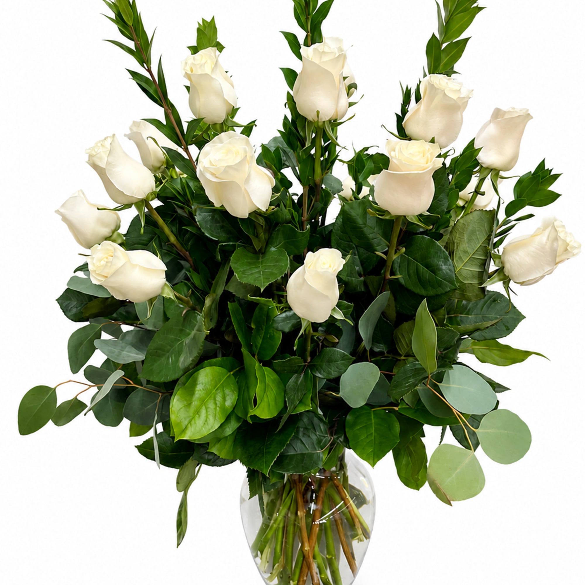 Elegant and timeless, these white long-stemmed roses nestled in lush greenery make