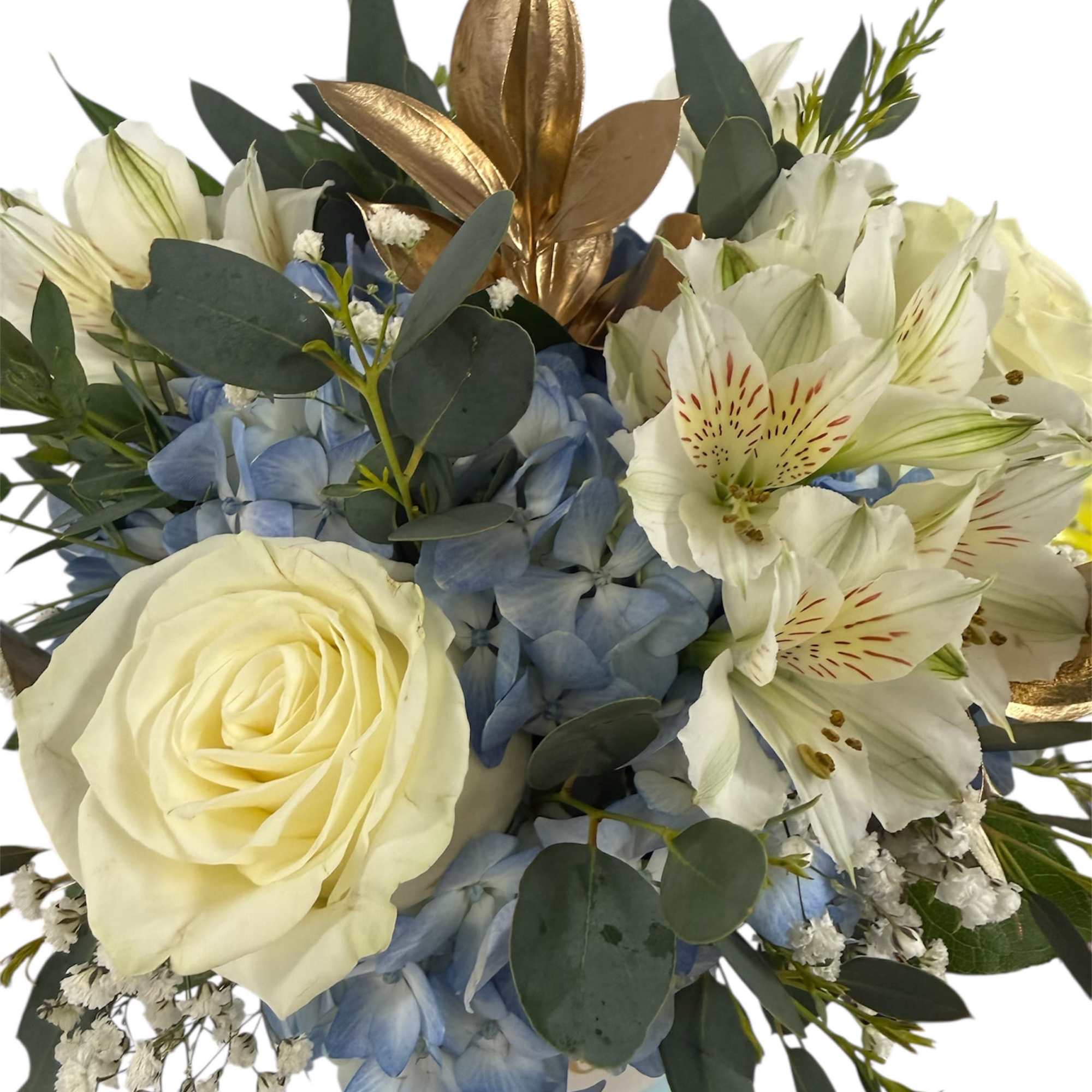 White roses and blue hydrangeas with white alstroemeria in a vase
