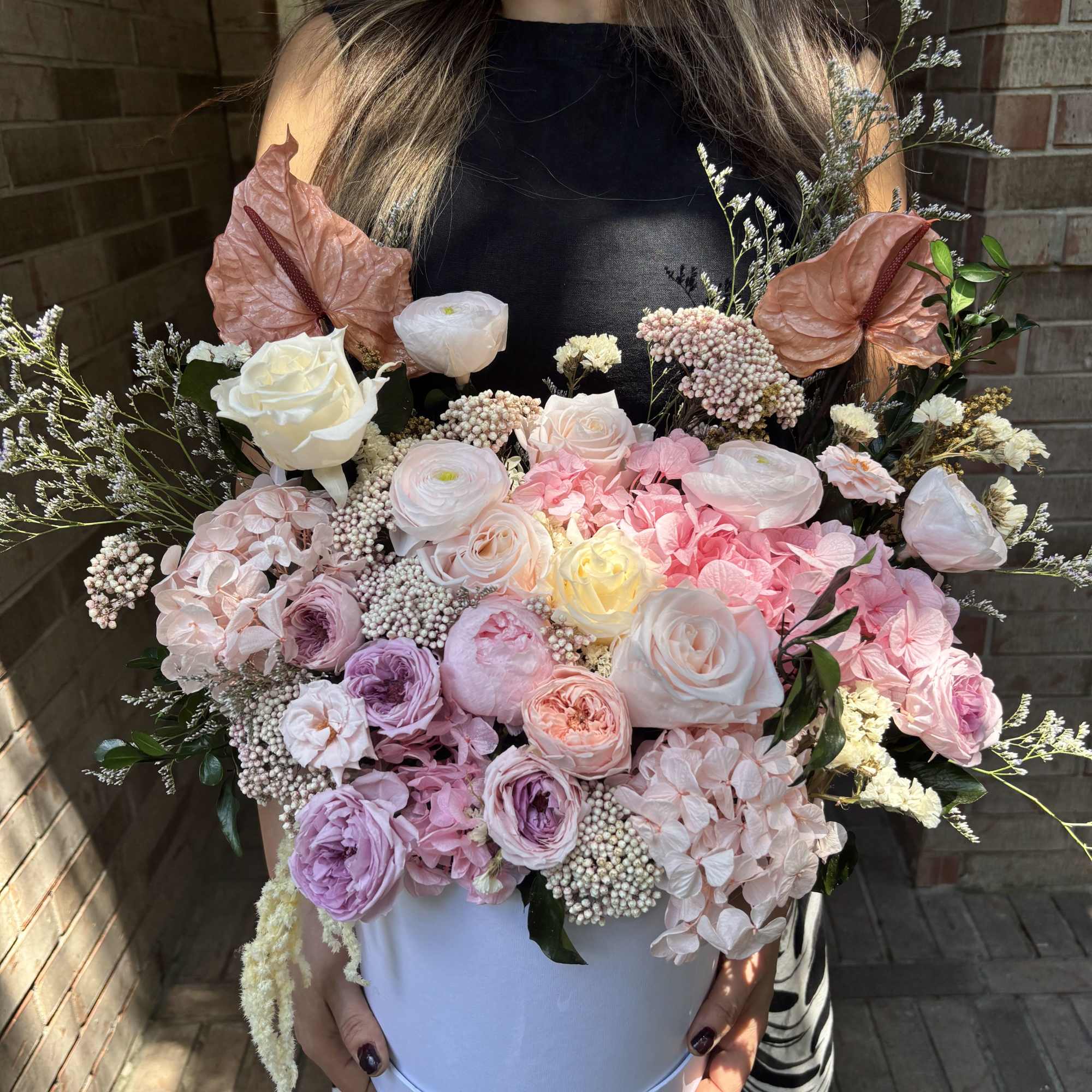 Overflowing with real and natural preserved roses, hydrangeas, ranunculus, carnations and airy, photo 2 of 3