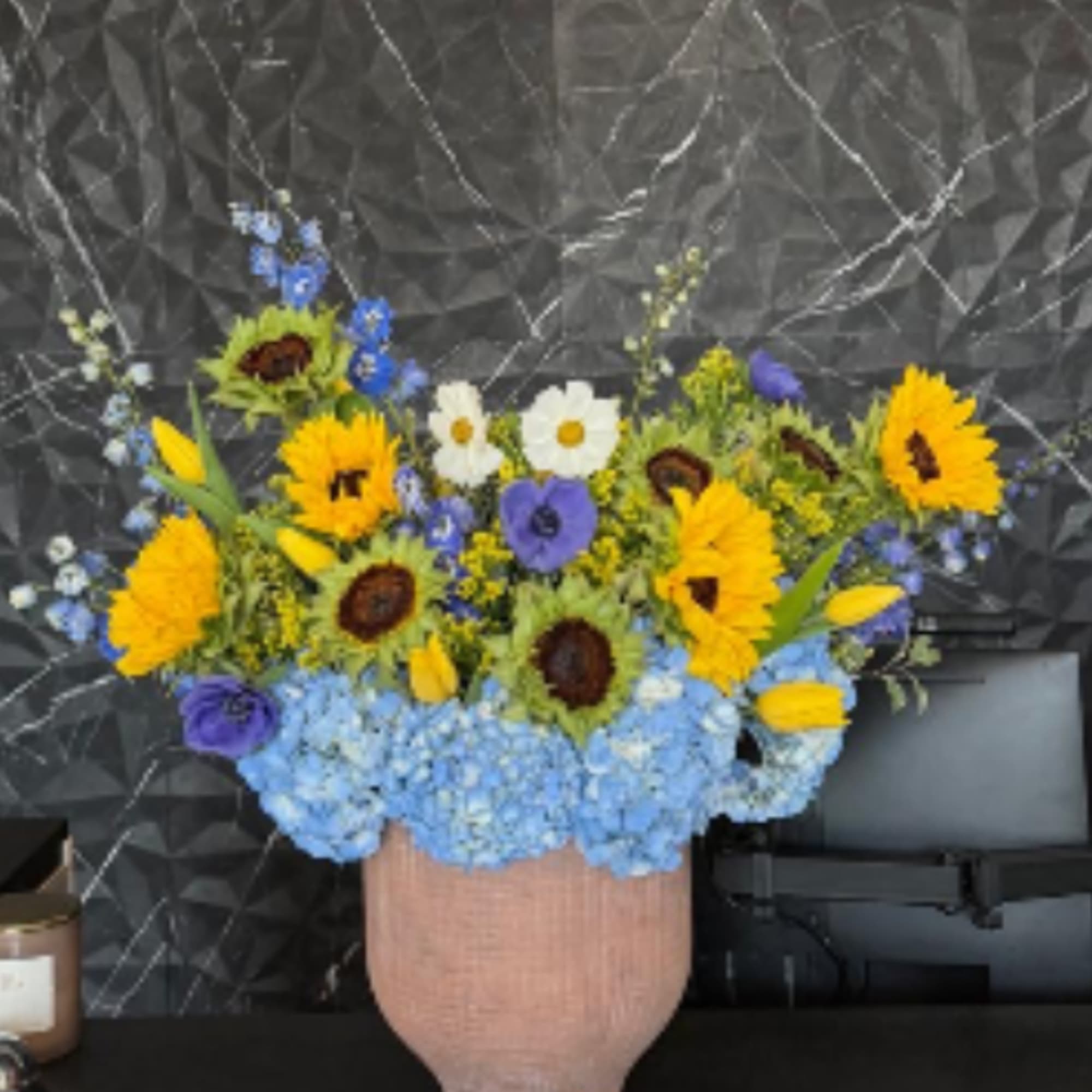 Bright yellow sunflowers take center stage in this cheerful mixed-color flower arrangement, photo 2 of 2
